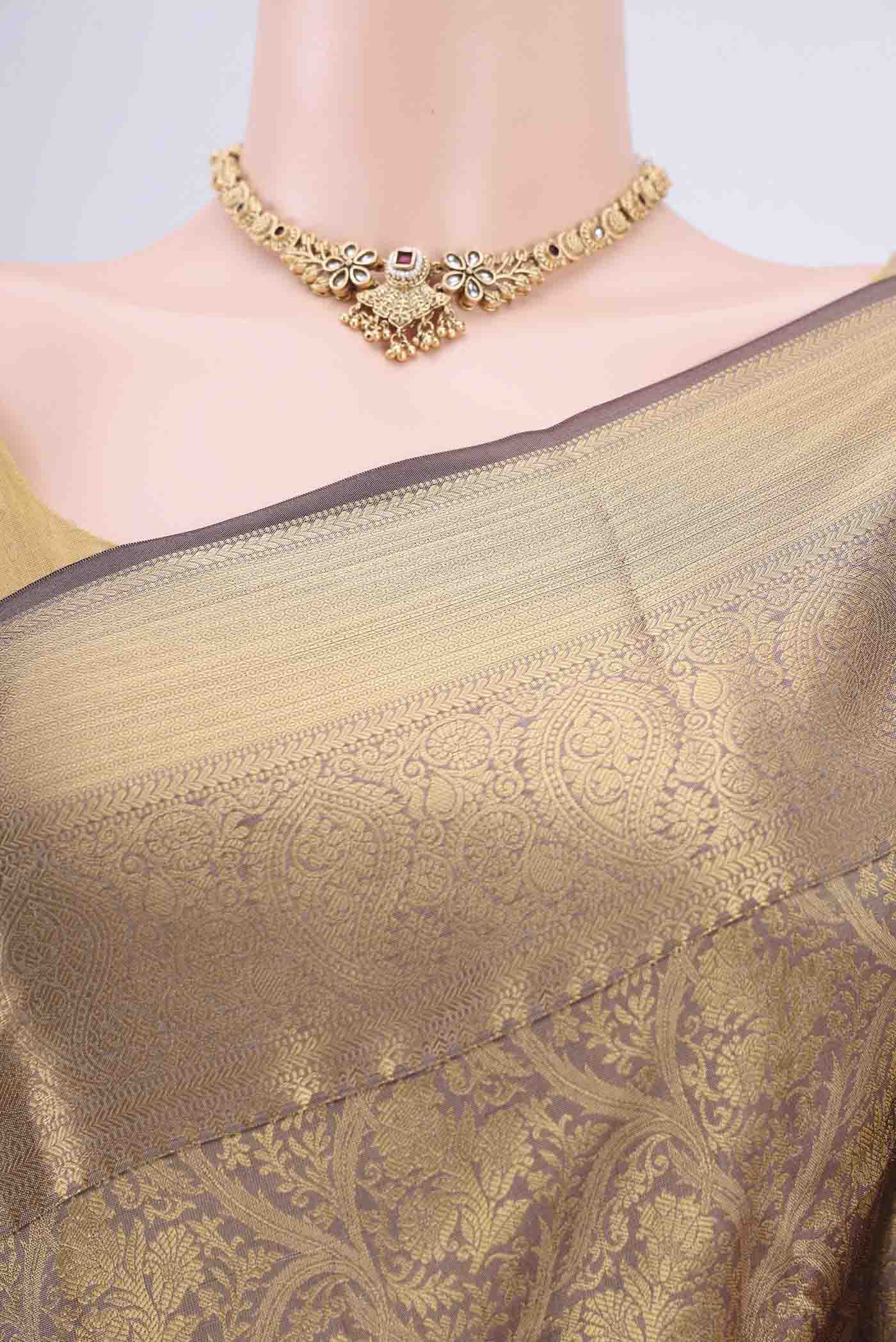 Border image of Brown Dual Tone Bangalore Silk Saree with Zari Brocade on the body and Zari Border. 