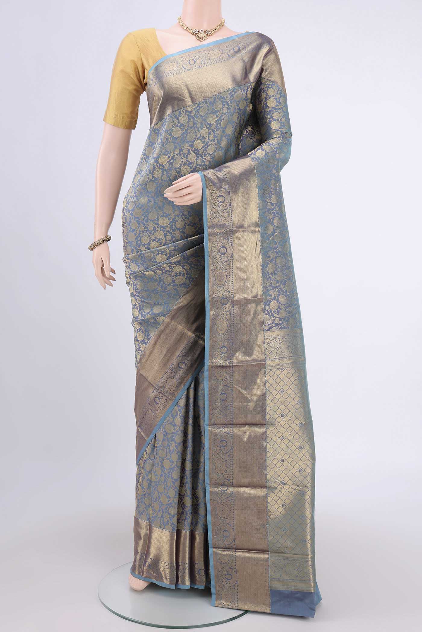 Maya Blue Dual Tone Bangalore Silk Saree with Zari Brocade on the body and Zari Border.  displayed on a mannequin