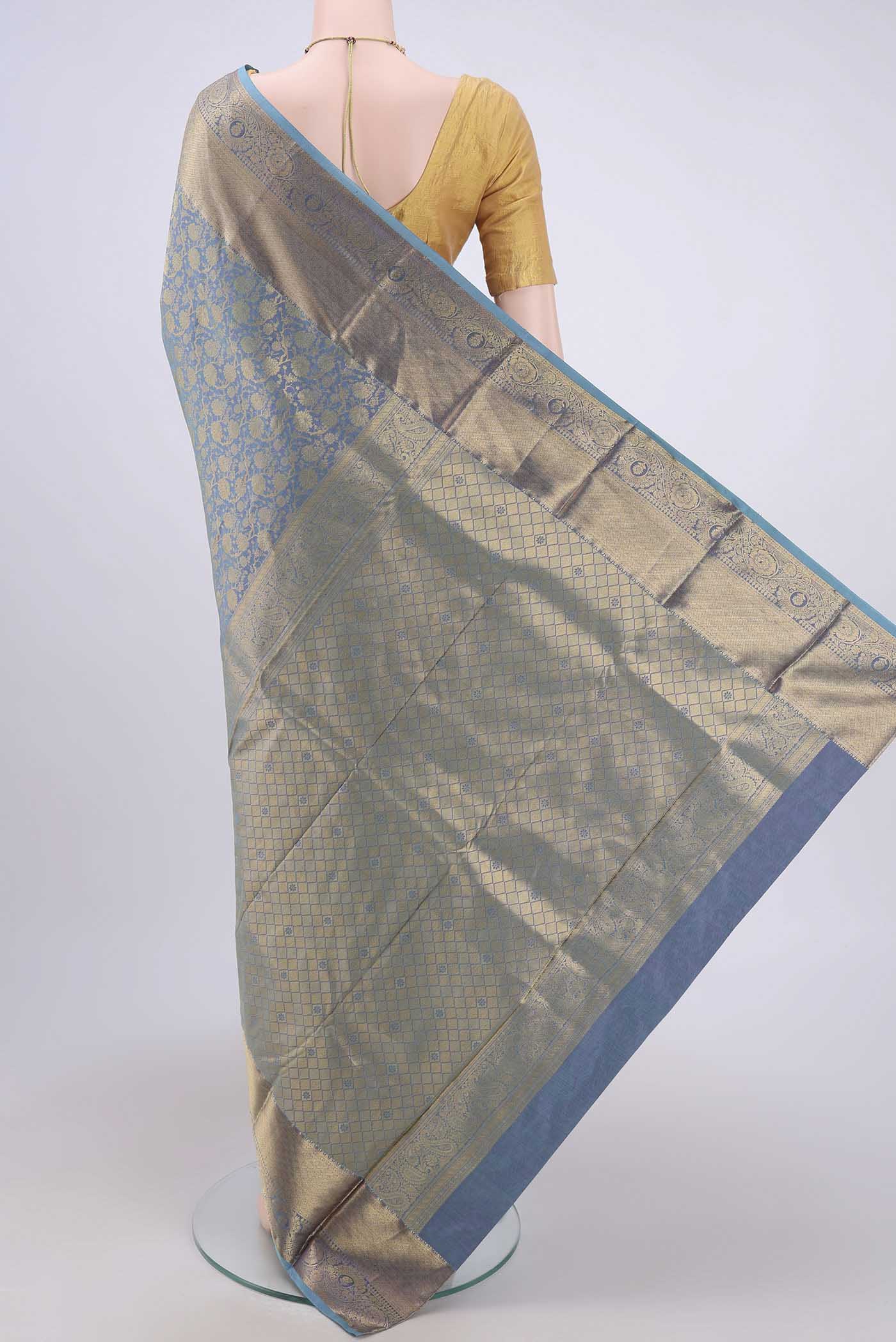 Flat view of Maya Blue Dual Tone Bangalore Silk Saree with Zari Brocade on the body and Zari Border. 