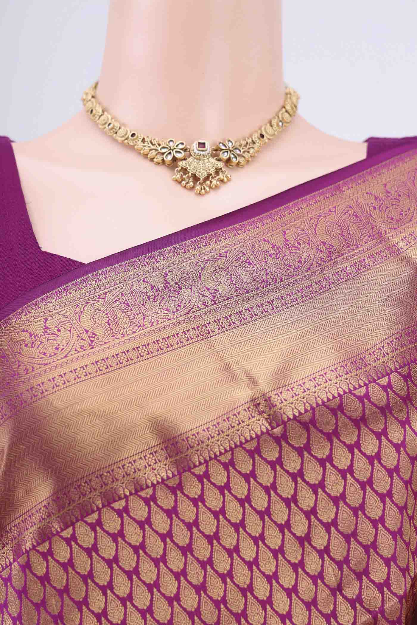 Border image of Magenta Bangalore Silk Saree with Zari Brocade on the body and Zari Border. 