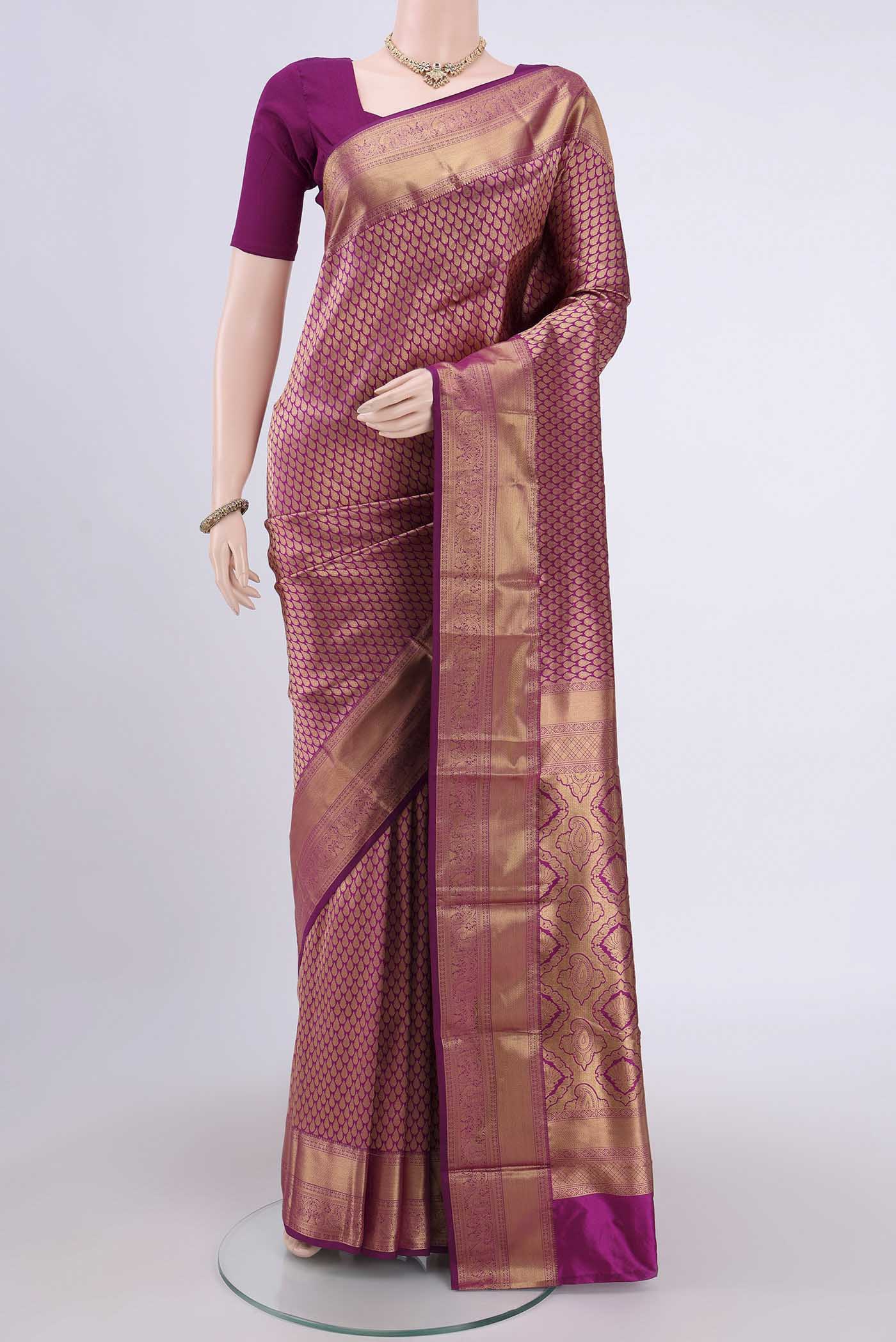 Magenta Bangalore Silk Saree with Zari Brocade on the body and Zari Border.  displayed on a mannequin