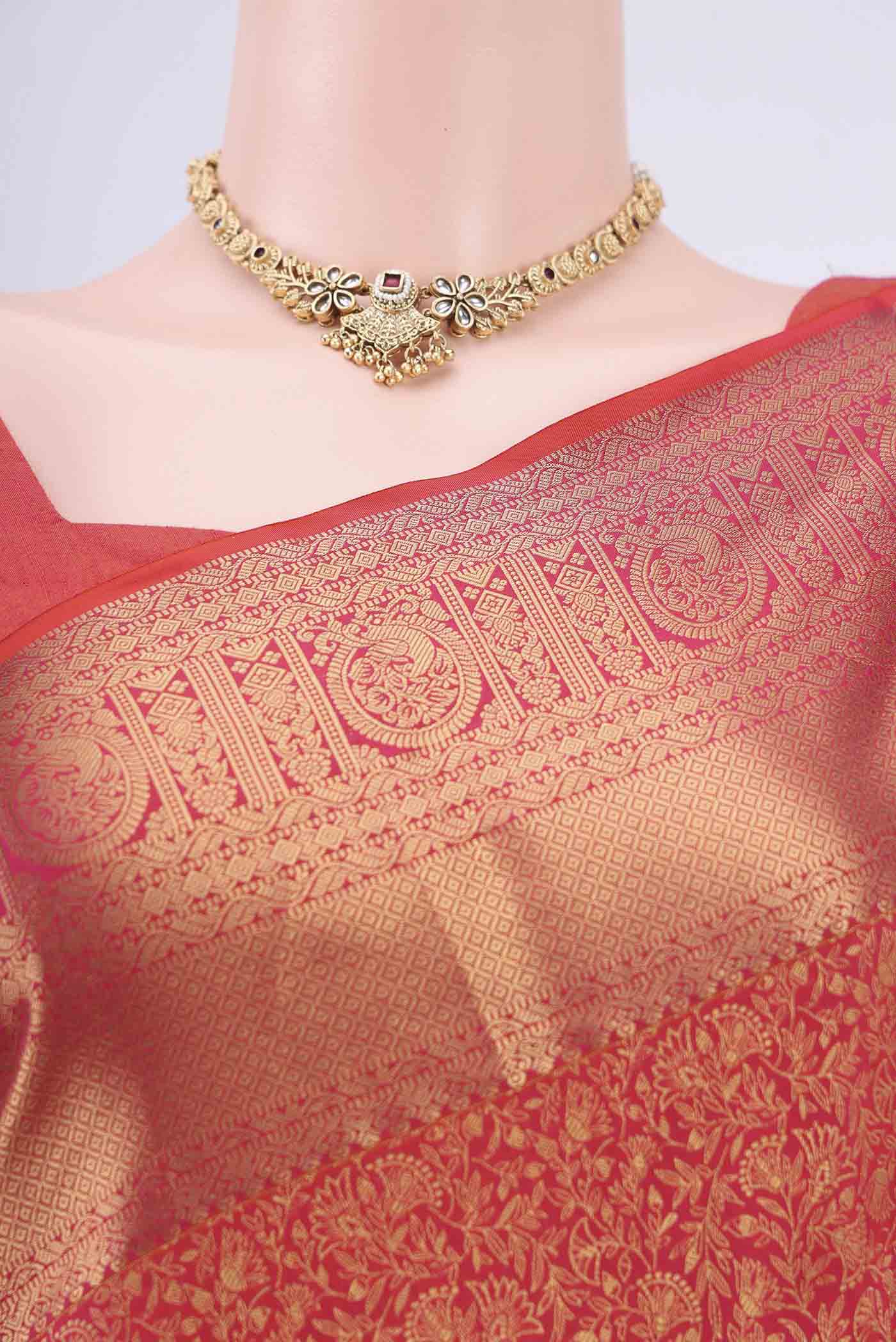 Border image of Rust Bangalore Silk Saree with Zari Brocade on the body and Zari Border. 