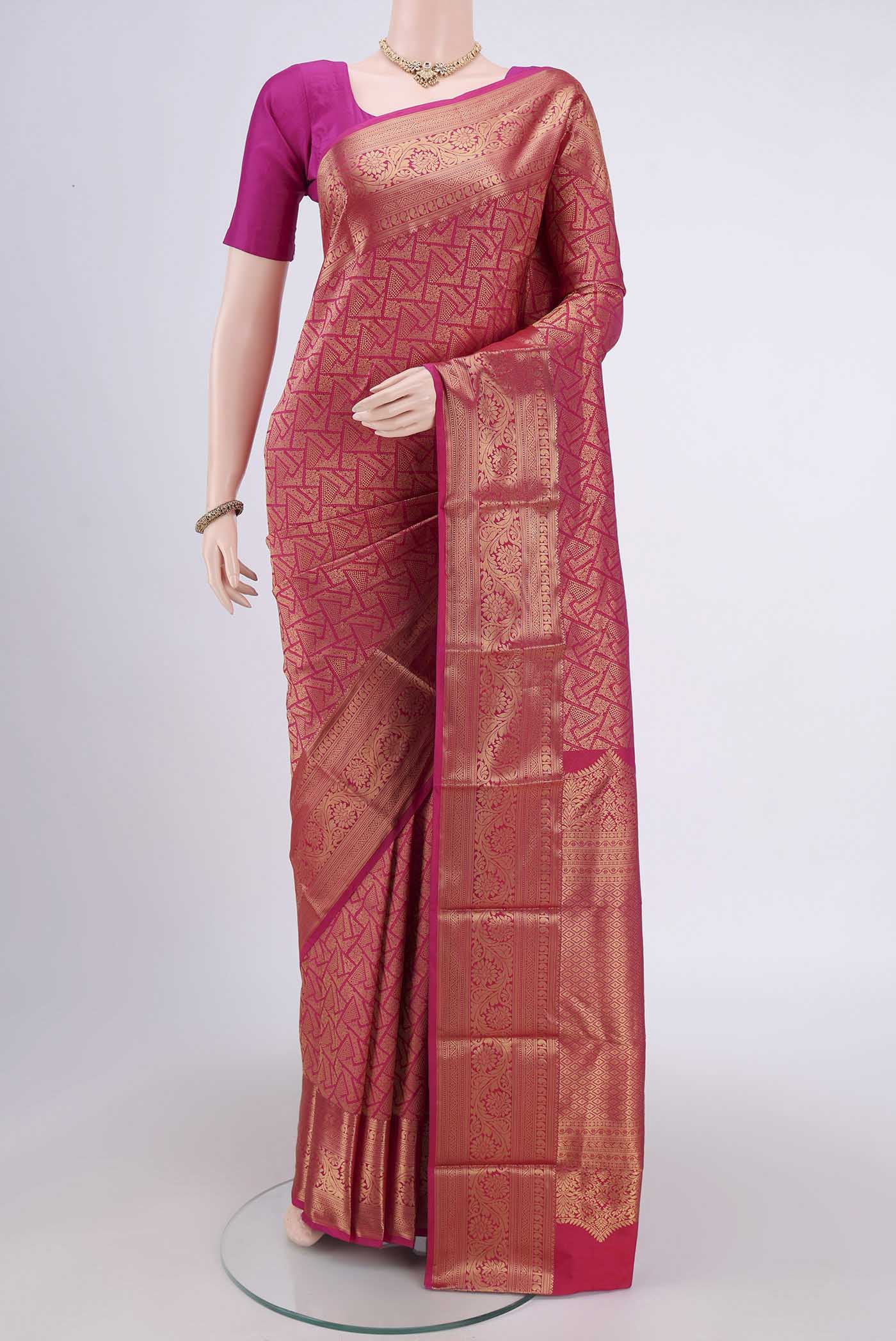 Rani Pink Dual Tone Bangalore Silk Saree with Zari Brocade on the body and Zari Border.  displayed on a mannequin