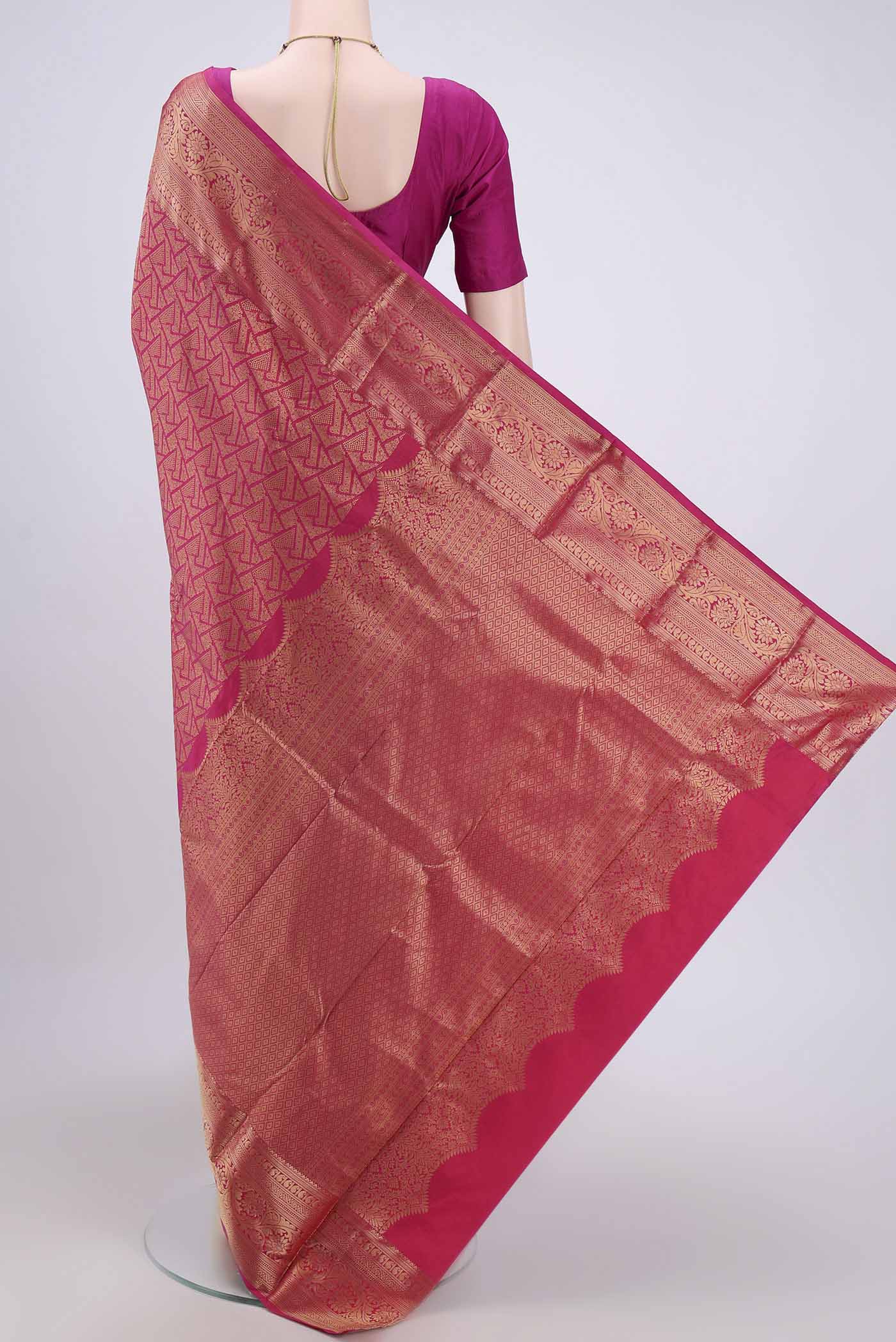 Flat view of Rani Pink Dual Tone Bangalore Silk Saree with Zari Brocade on the body and Zari Border. 