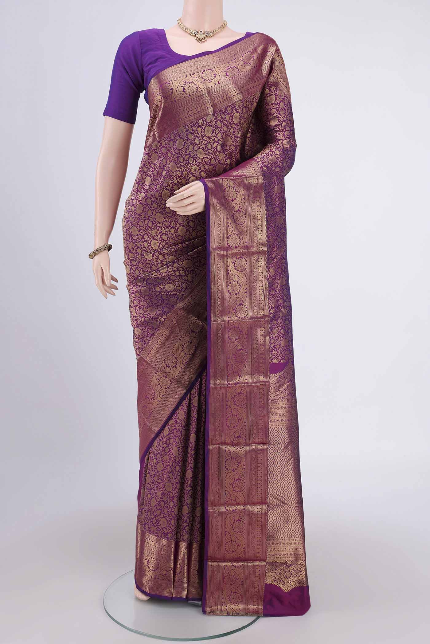 Purple Bangalore Silk Saree with Zari Brocade on the body and Zari Border.  displayed on a mannequin