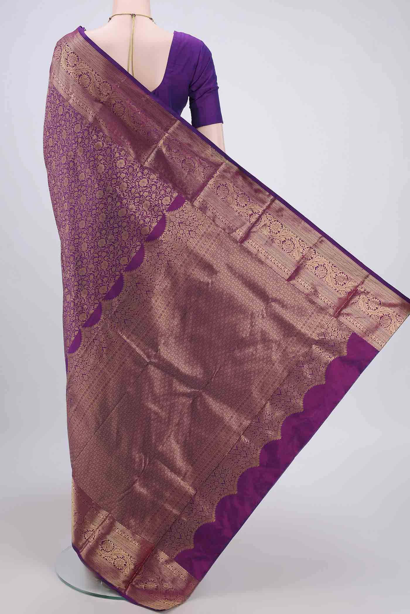 Flat view of Purple Bangalore Silk Saree with Zari Brocade on the body and Zari Border. 