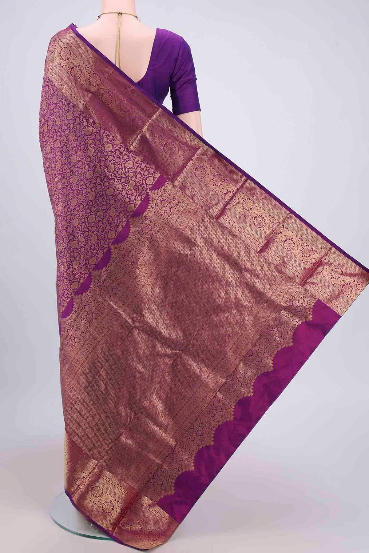Flat view of Purple Bangalore Silk Saree with Zari Brocade on the body and Zari Border. 