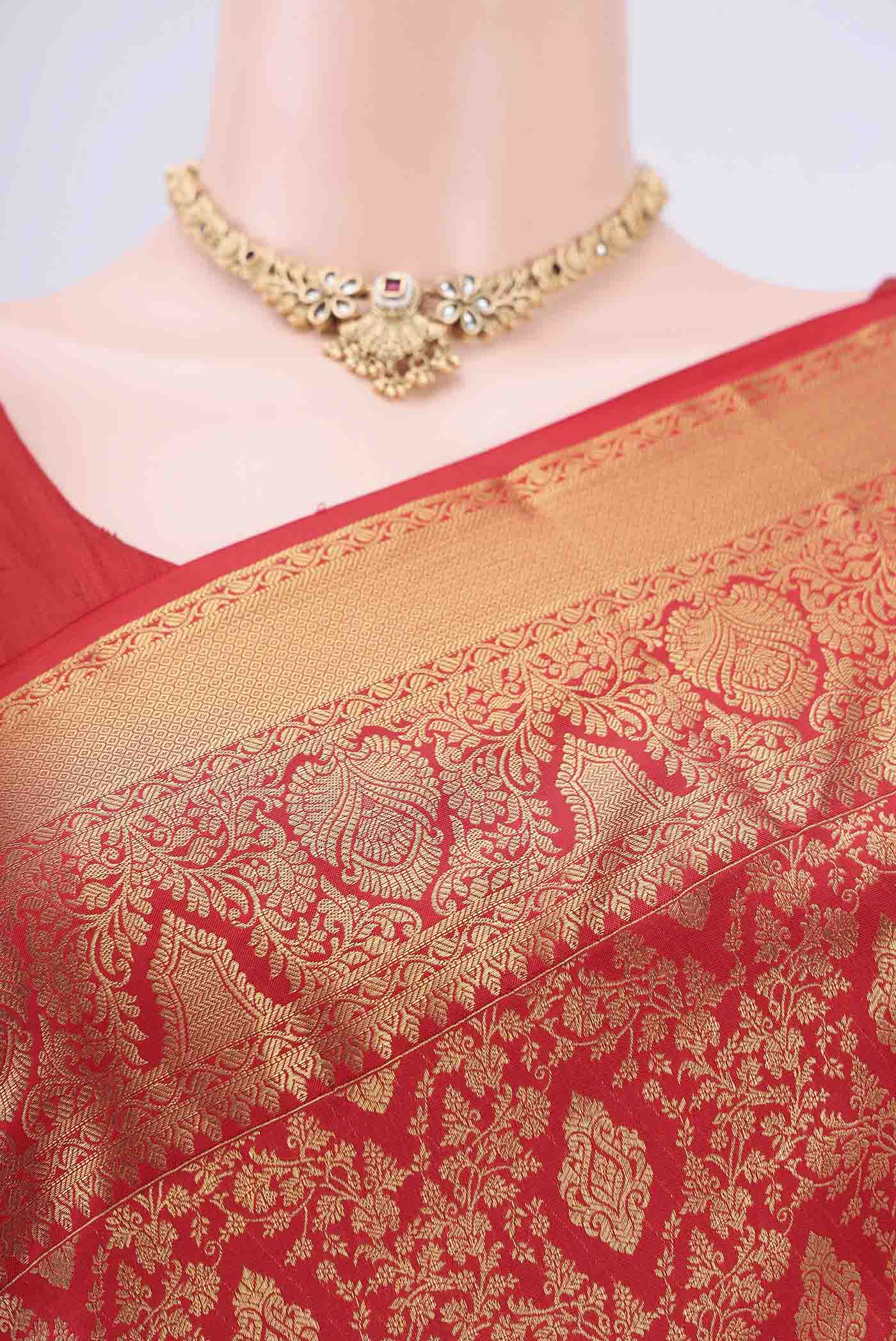 Border image of Red Bangalore Silk Saree with Zari Brocade on the body and Zari Border. 