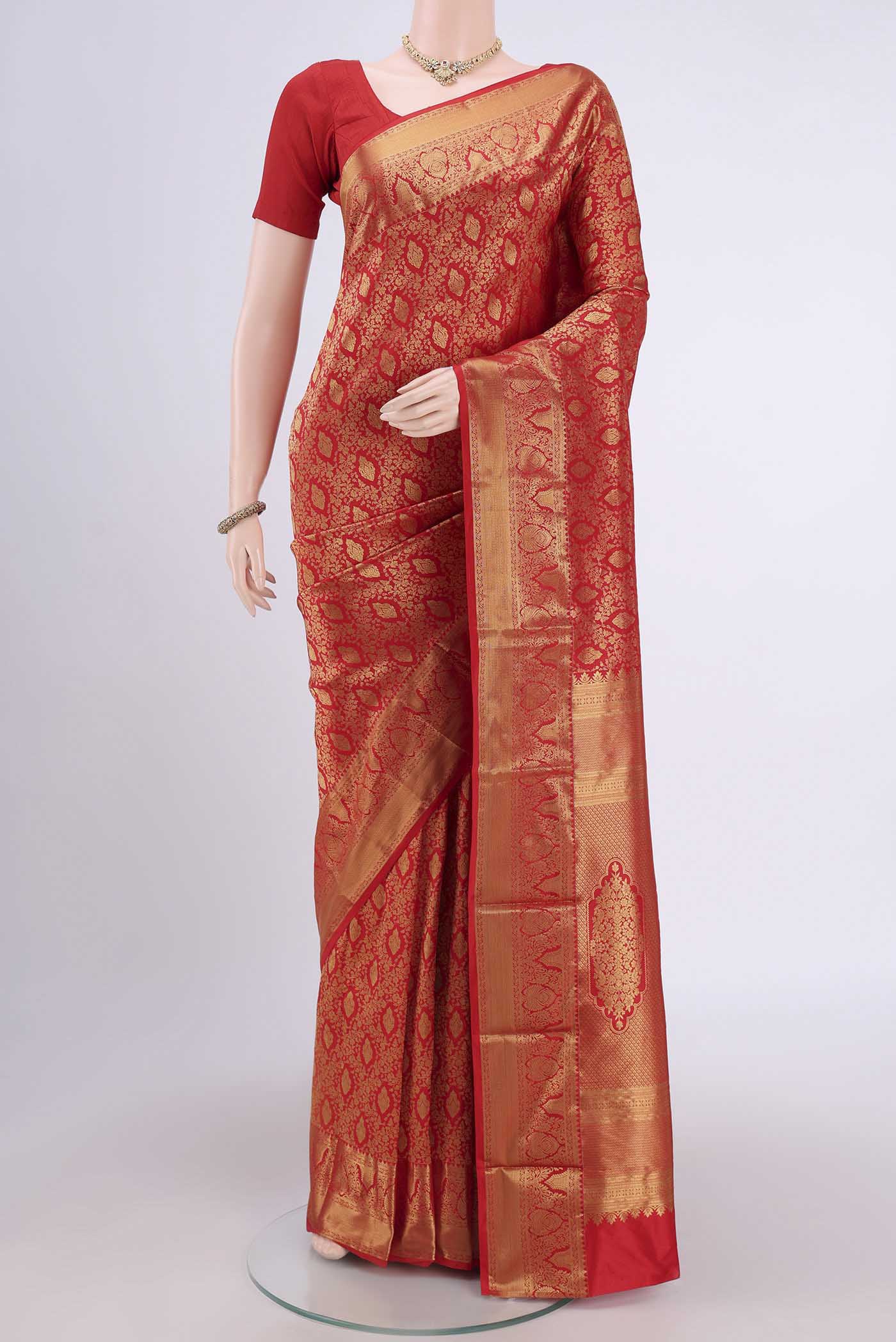 Red Bangalore Silk Saree with Zari Brocade on the body and Zari Border.  displayed on a mannequin