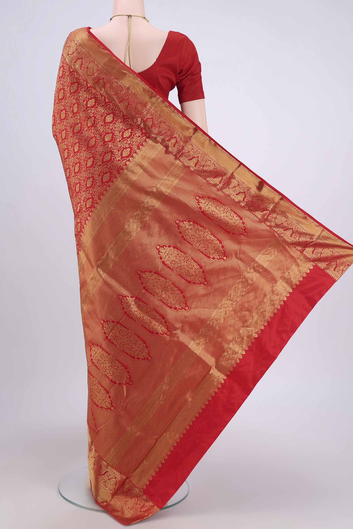 Flat view of Red Bangalore Silk Saree with Zari Brocade on the body and Zari Border. 