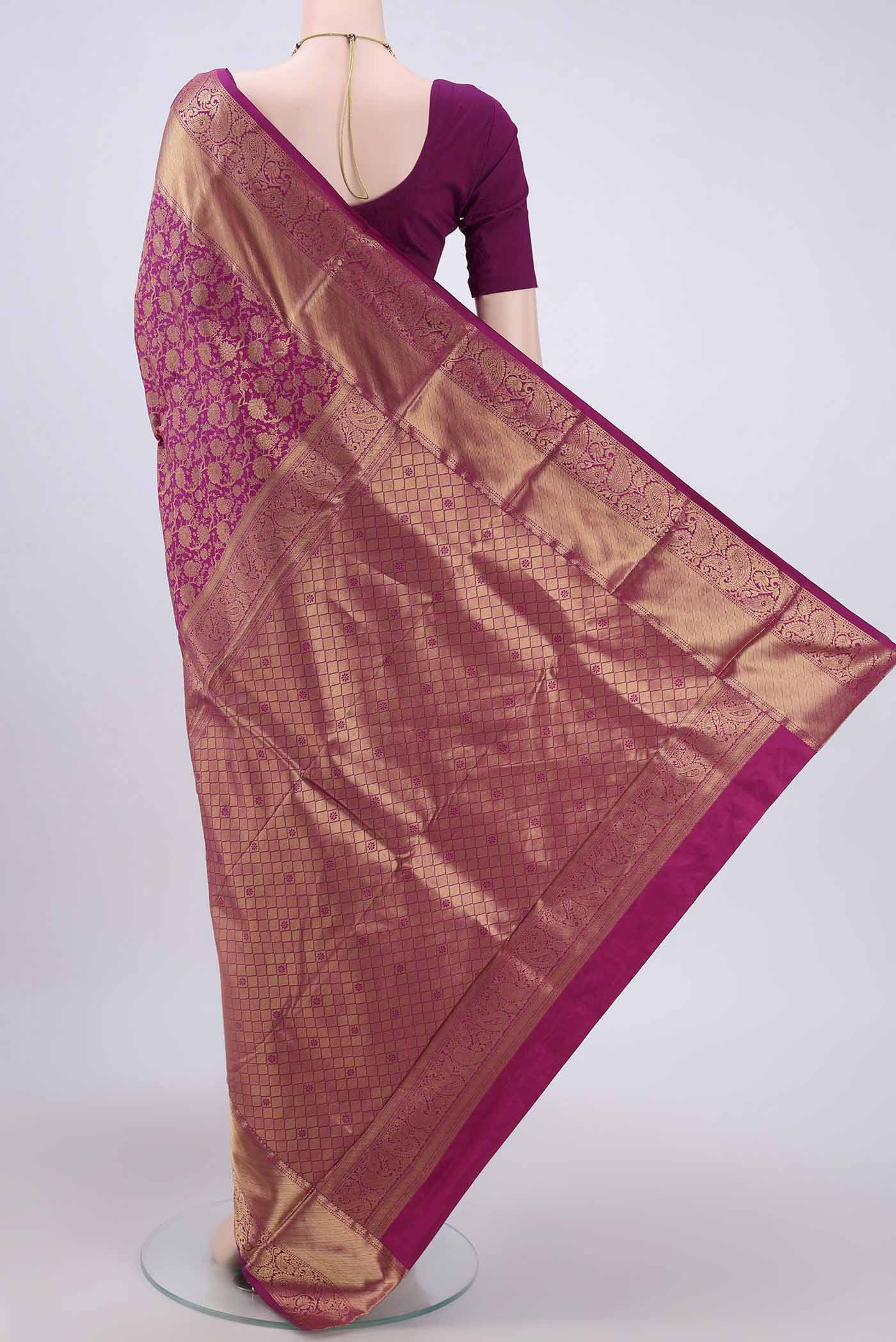 Flat view of Magenta Bangalore Silk Saree with Zari Brocade on the body and Zari Border. 