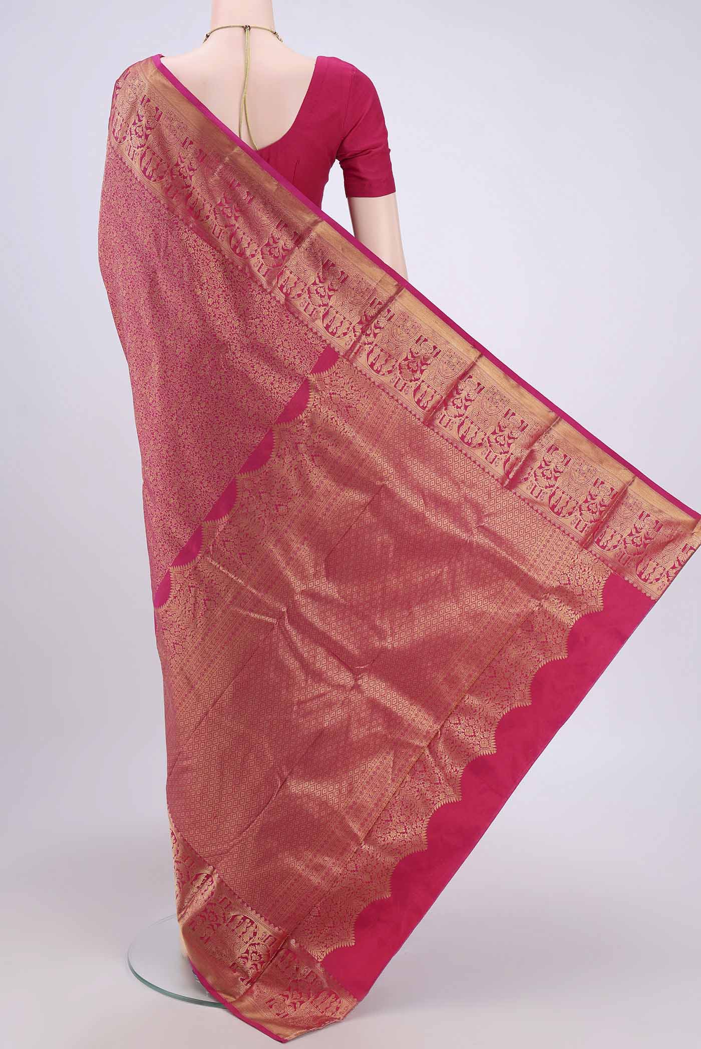 Flat view of Rani Pink Dual Tone Bangalore Silk Saree with Zari Brocade on the body and Zari Border. 