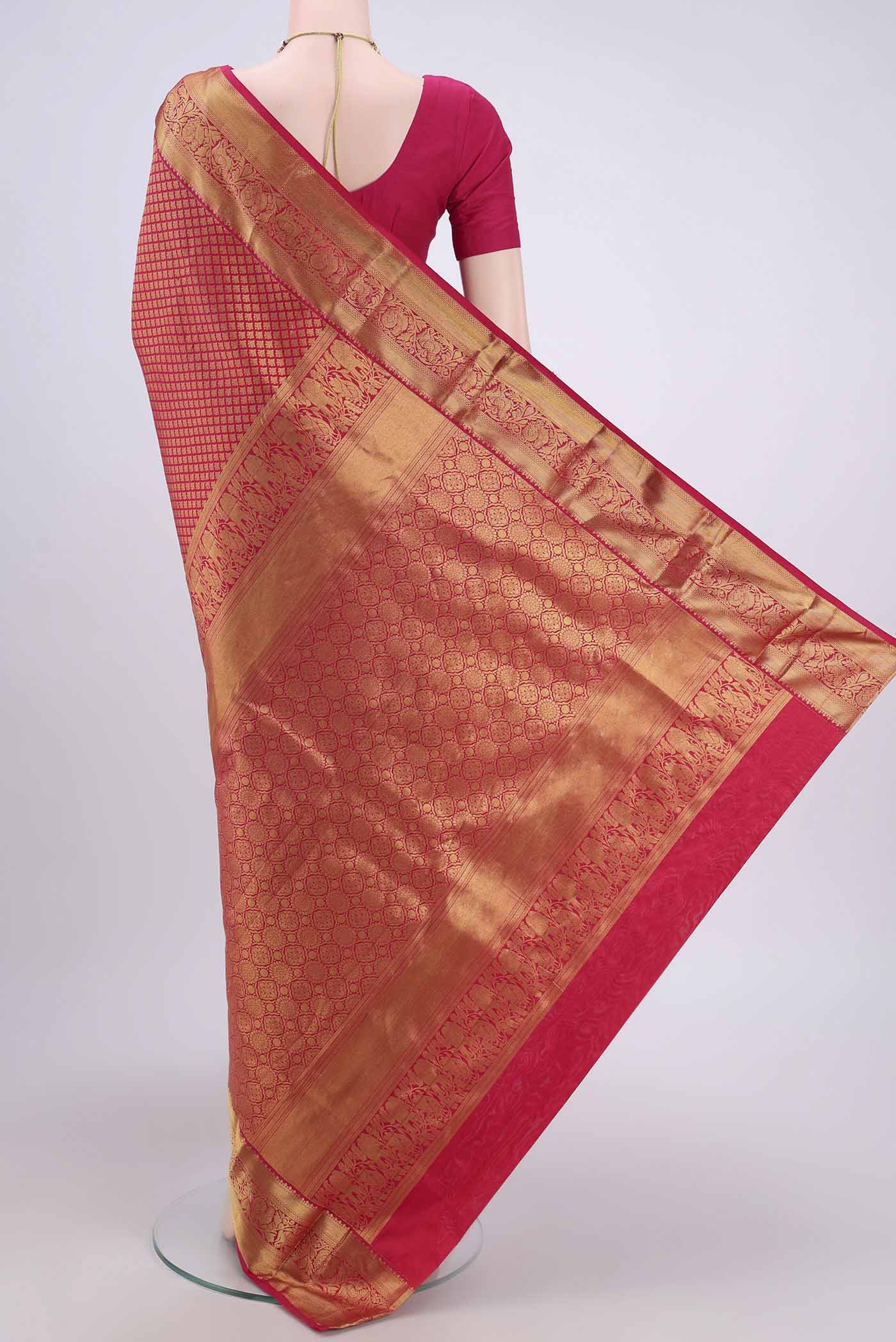 Flat view of Dark Pink Bangalore Silk Saree with Zari Brocade on the body and Zari Border. 