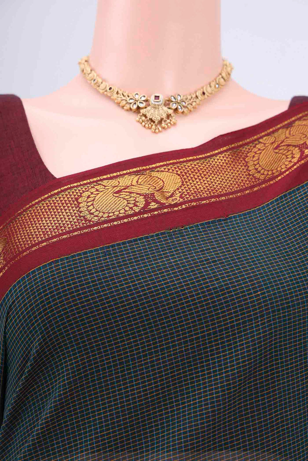 Border image of Bottle Green Kanchi Cotton Saree with Stripes on the body and Zari Border. 