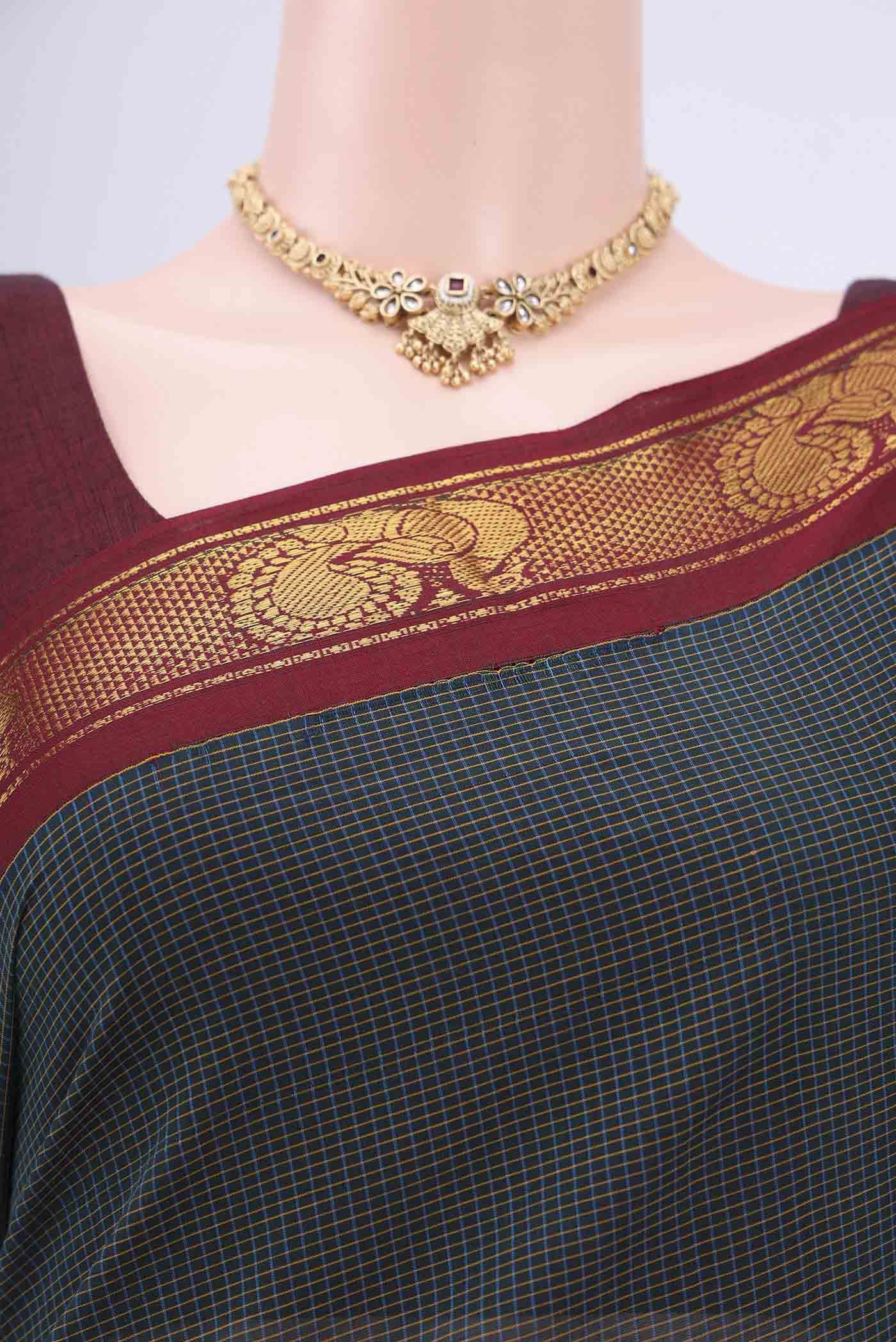 Border image of Bottle Green Kanchi Cotton Saree with Stripes on the body and Zari Border. 