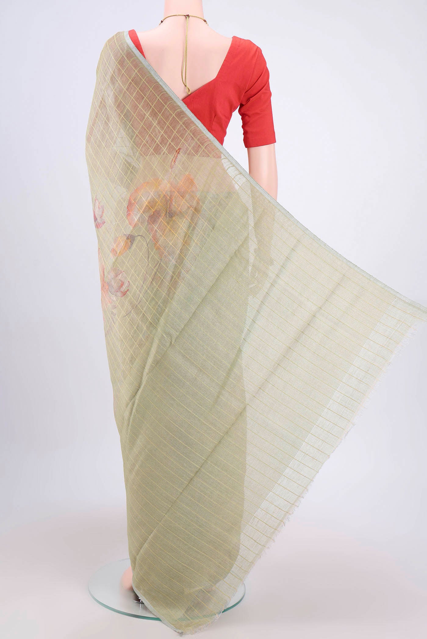 Flat view of Mehandi Green Linen Cotton Saree with Floral Print on the body and Zari Border. 