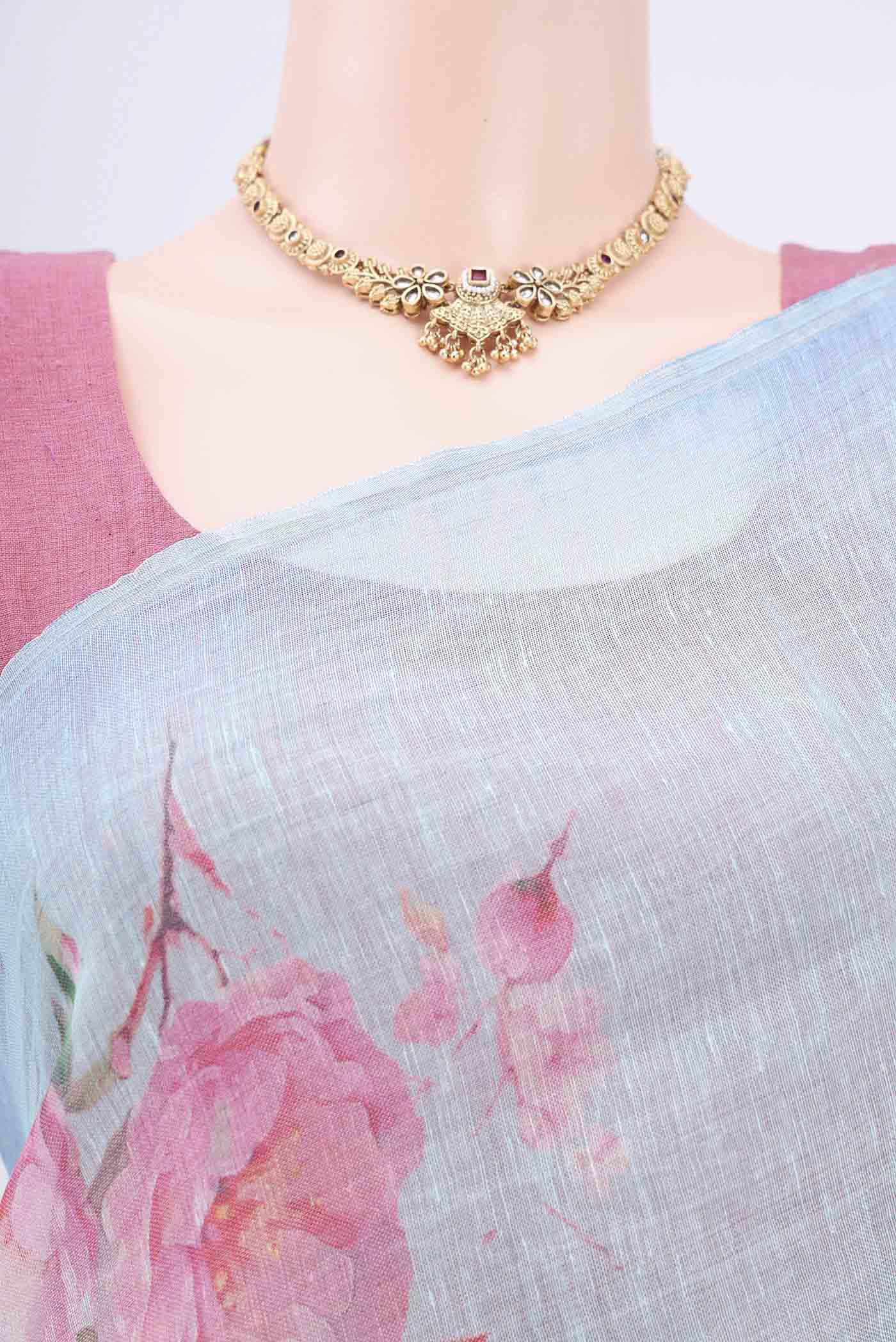 Border image of Mint Green Linen Cotton Saree with Floral Print on the body and Zari Border. 