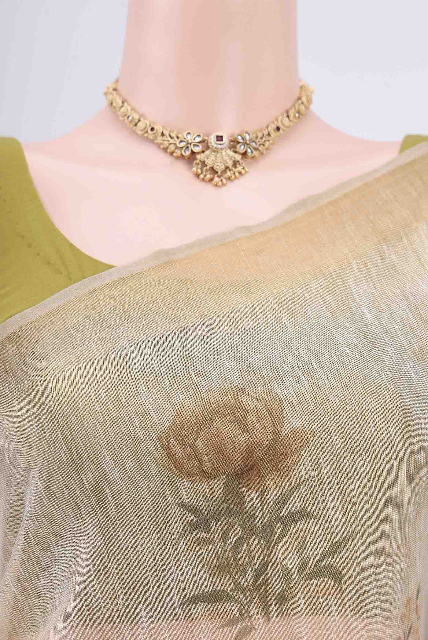 Border image of Mustard Linen Cotton Saree with Floral Print on the body and Zari Border. 