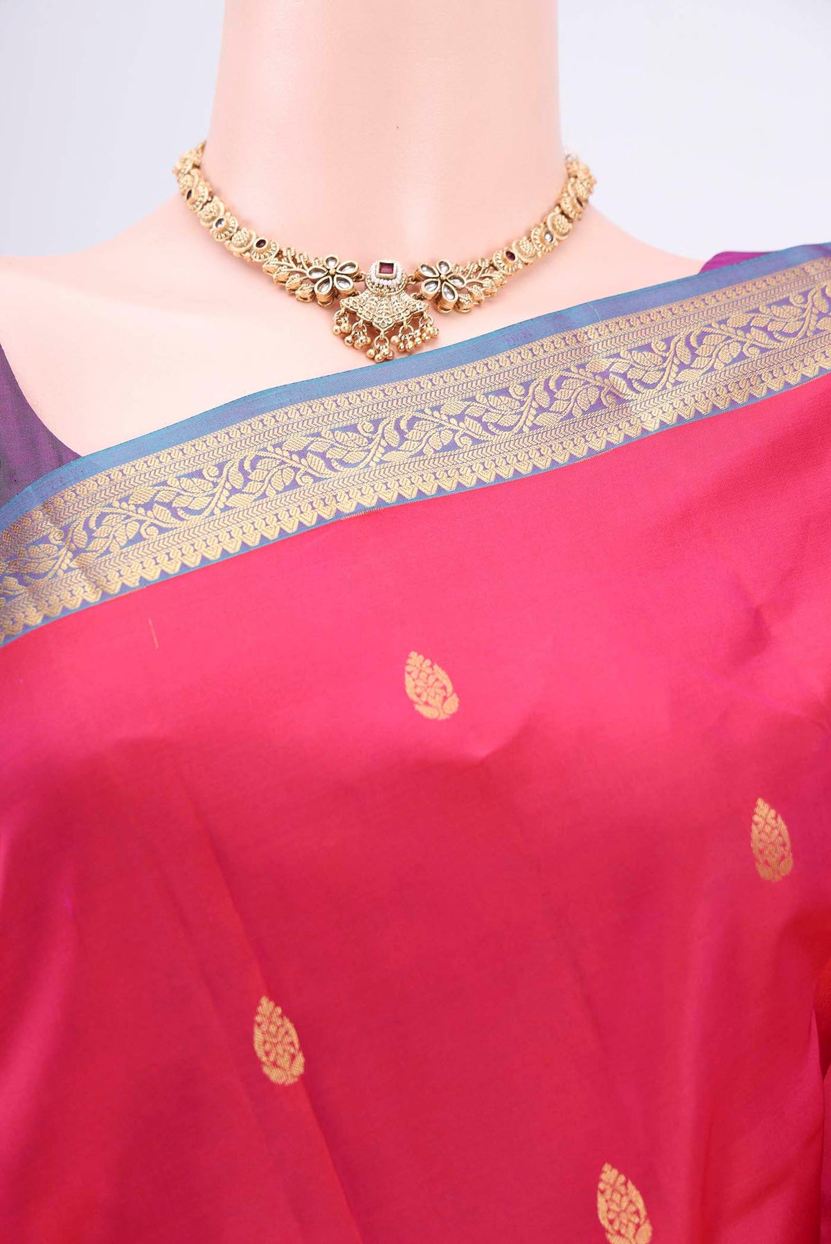 Border image of Rani Pink Dual Tone Nangavalli Silk [ Salem ] Saree with Zari Butta on the body and Zari Border. 