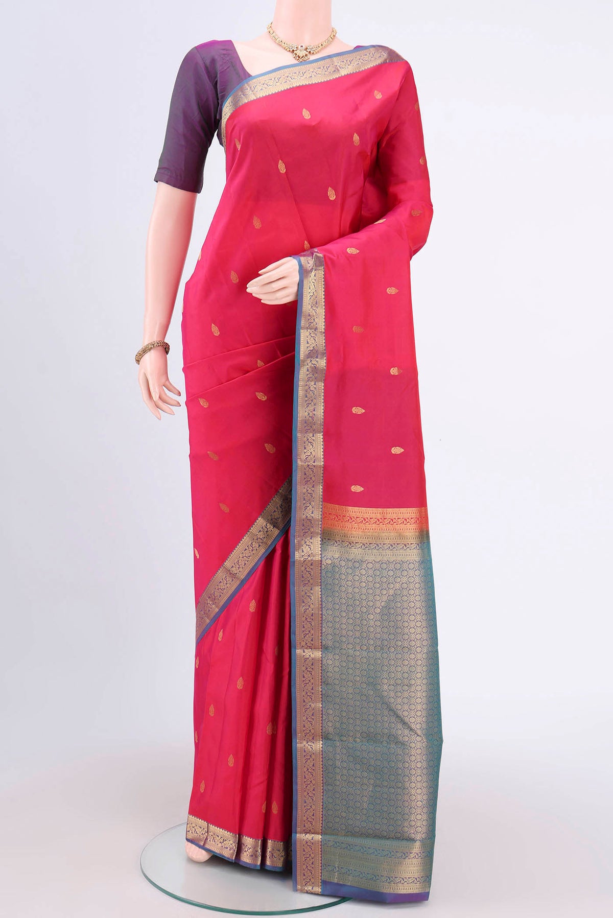 Rani Pink Dual Tone Nangavalli Silk [ Salem ] Saree with Zari Butta on the body and Zari Border.  displayed on a mannequin