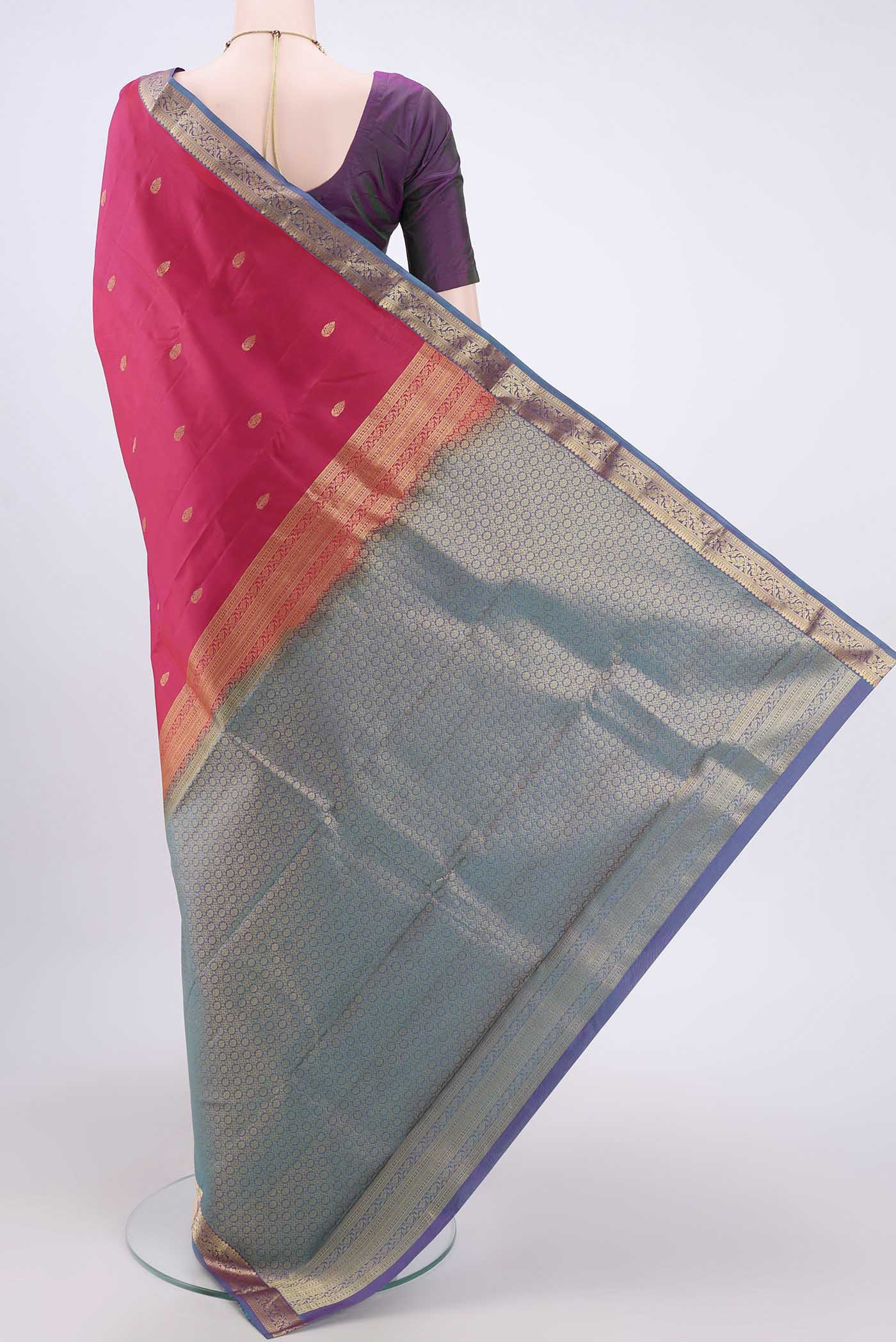 Flat view of Rani Pink Dual Tone Nangavalli Silk [ Salem ] Saree with Zari Butta on the body and Zari Border. 