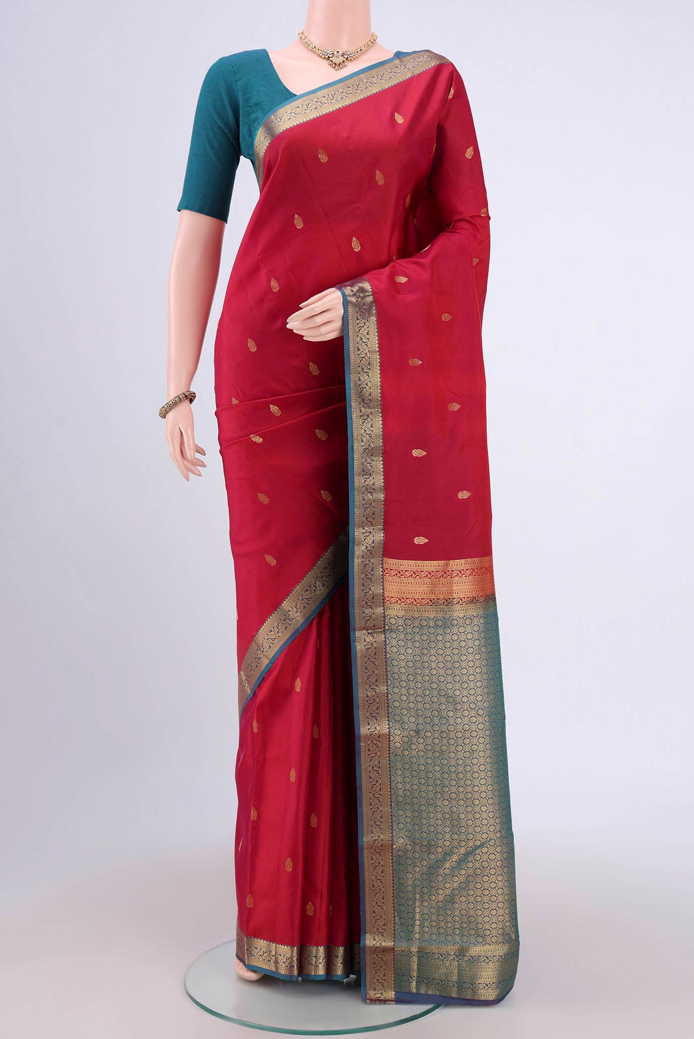 Dark Pink Nangavalli Silk [ Salem ] Saree with Zari Butta on the body and Zari Border.  displayed on a mannequin