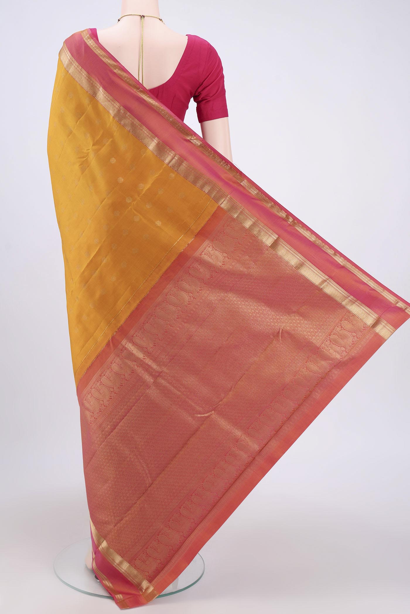 Flat view of Mustard Nangavalli Silk [ Salem ] Saree with Zari Butta on the body and Zari Border. 