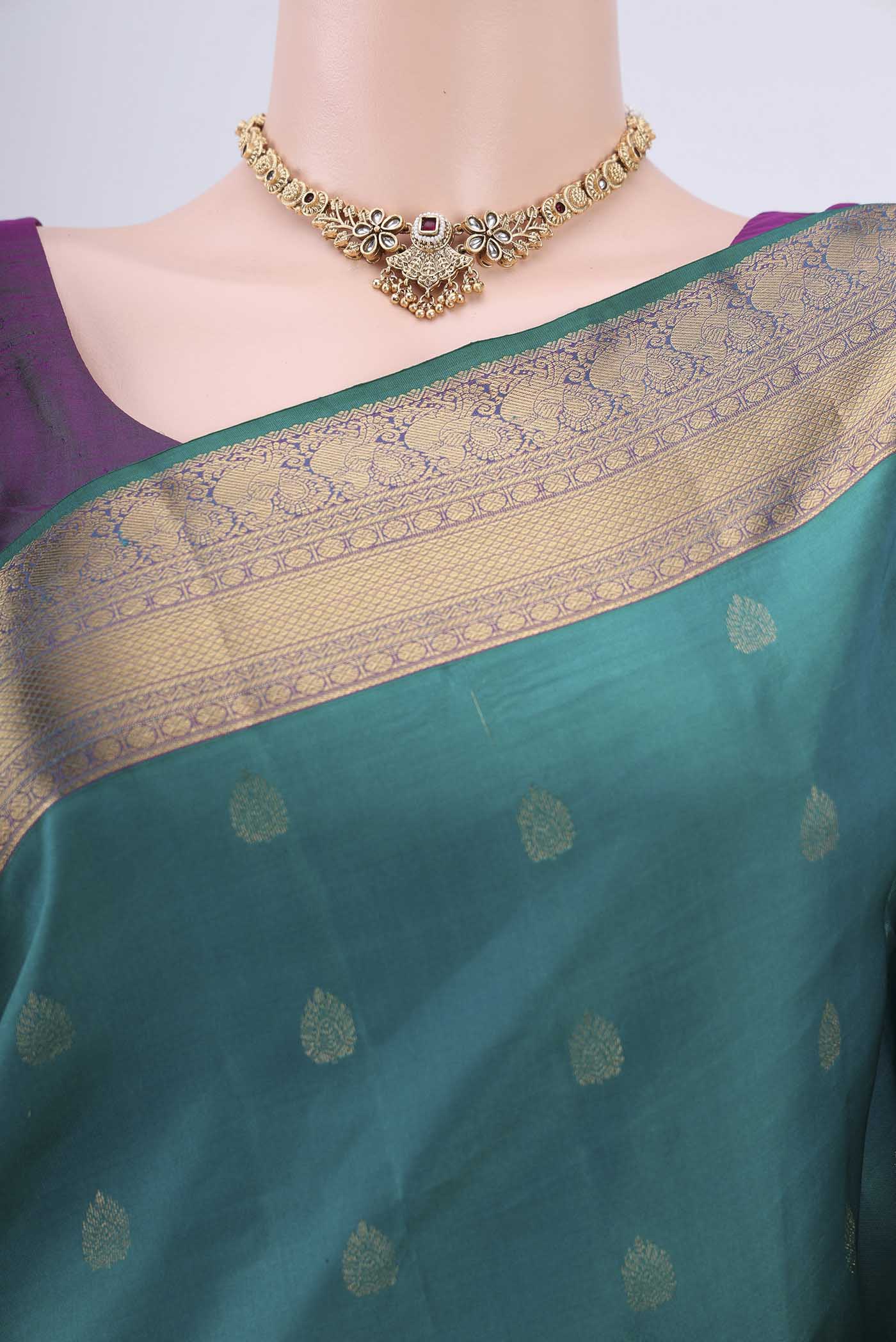Border image of Orange with Pink Dual Tone Kanchipuram Silk Saree with Zari Butta on the body and Zari Border. 
