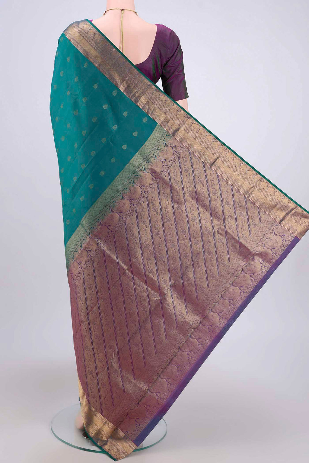 Flat view of Orange with Pink Dual Tone Kanchipuram Silk Saree with Zari Butta on the body and Zari Border. 