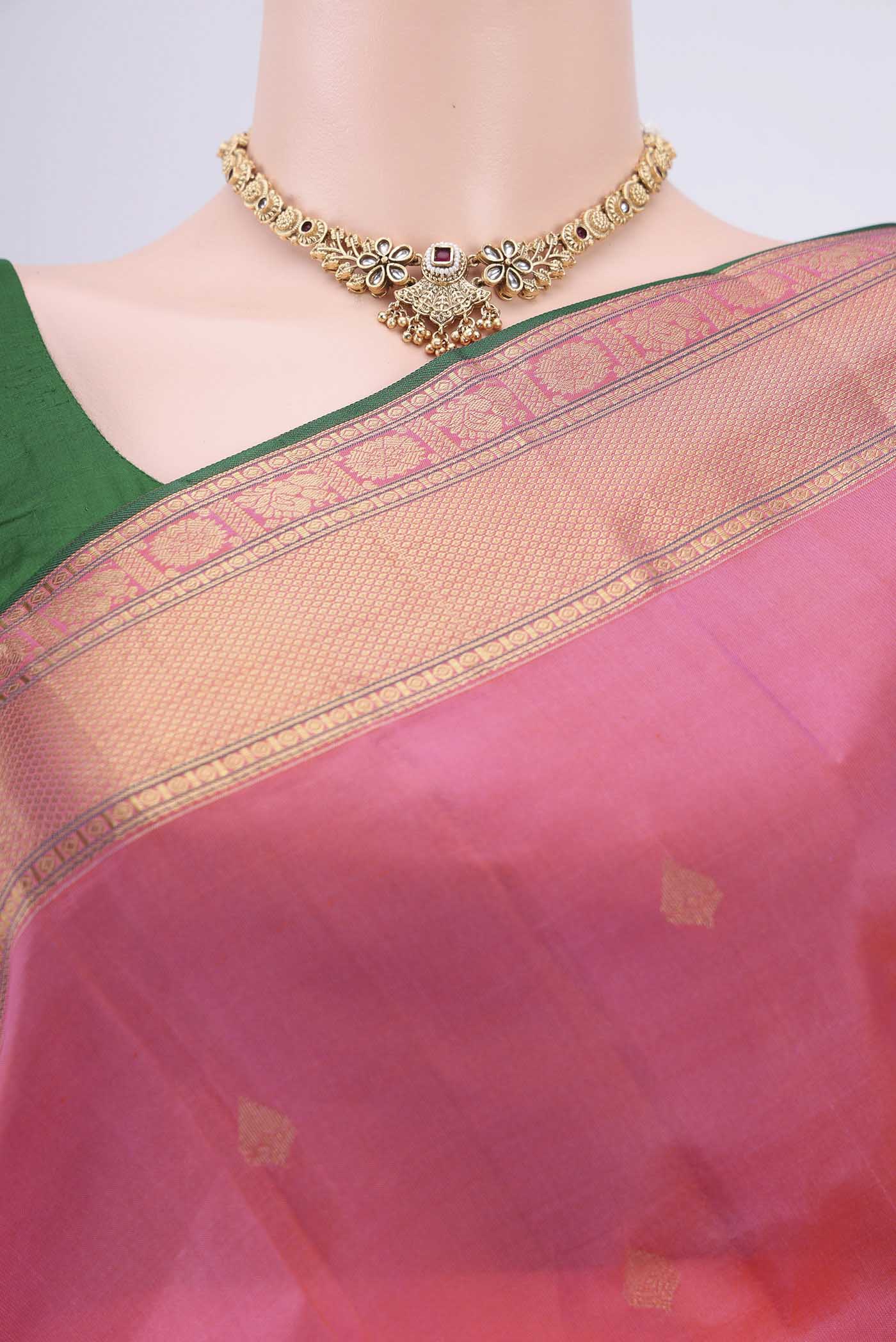 Border image of Pink Dual Tone Kanchipuram Silk Saree with Zari Butta on the body and Zari Border. 