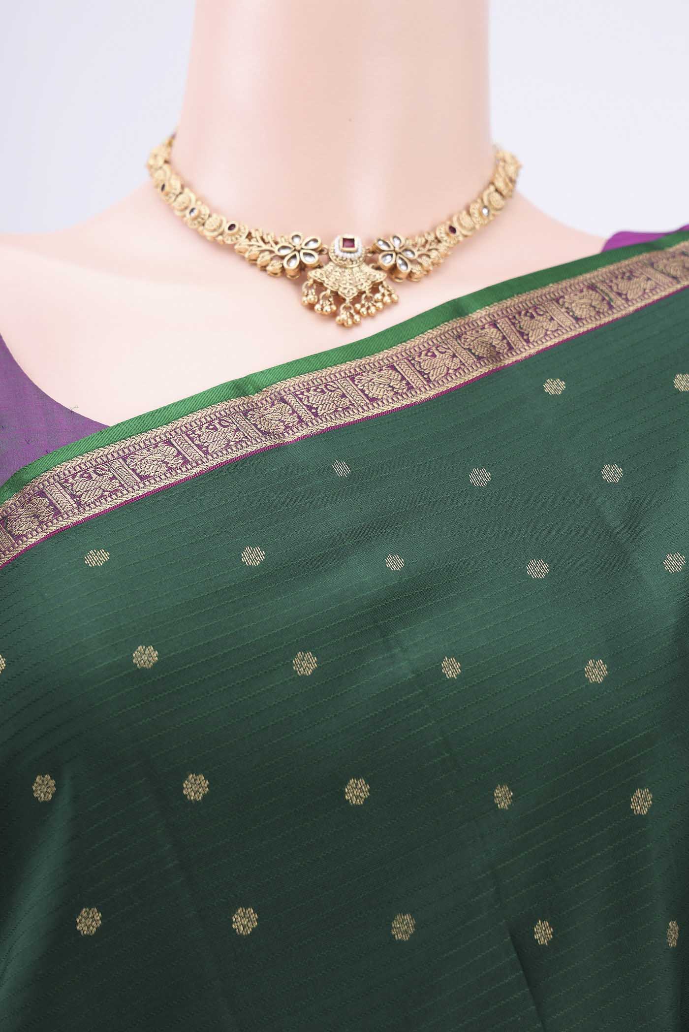 Border image of Bottle Green Dual Tone Nangavalli Silk [ Salem ] Saree with Zari Butta on the body and Zari Border. 