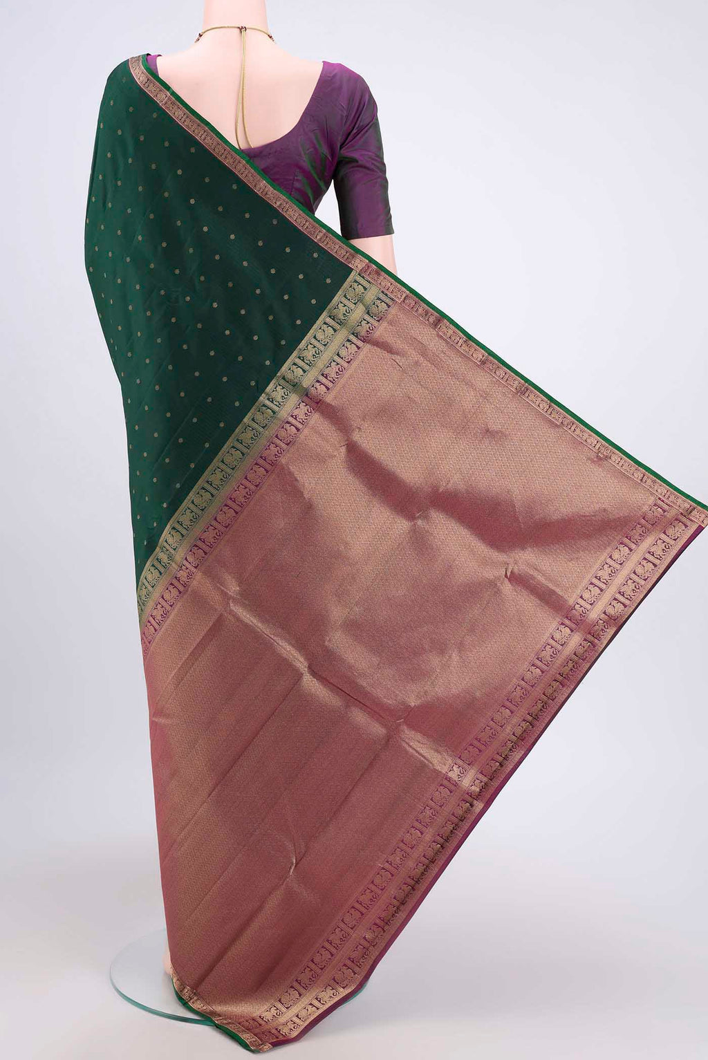 Flat view of Bottle Green Dual Tone Nangavalli Silk [ Salem ] Saree with Zari Butta on the body and Zari Border. 