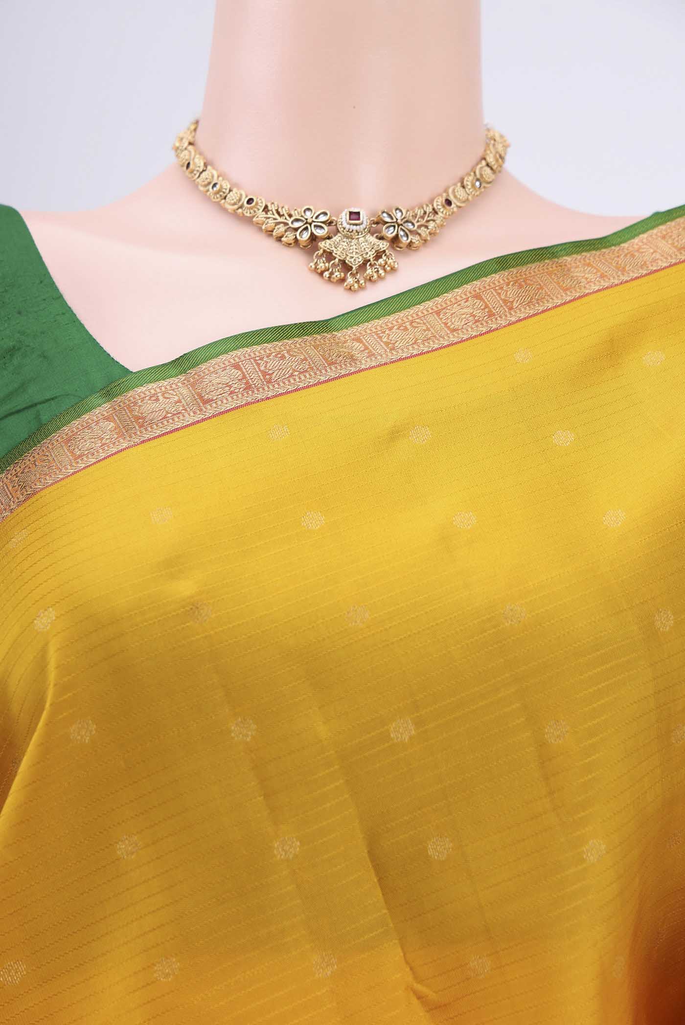 Border image of Yellow Nangavalli Silk [ Salem ] Saree with Zari Butta on the body and Zari Border. 