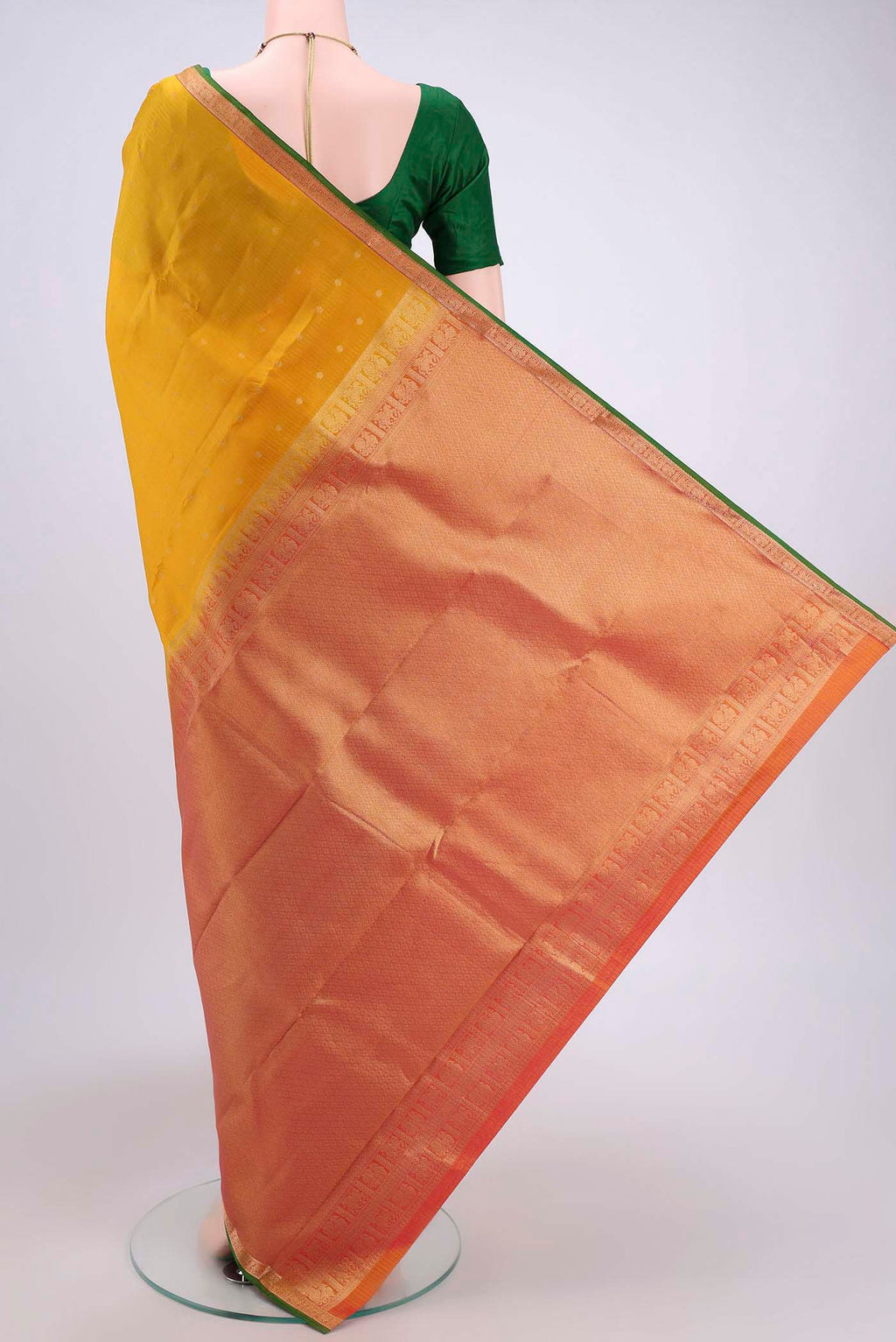 Flat view of Yellow Nangavalli Silk [ Salem ] Saree with Zari Butta on the body and Zari Border. 