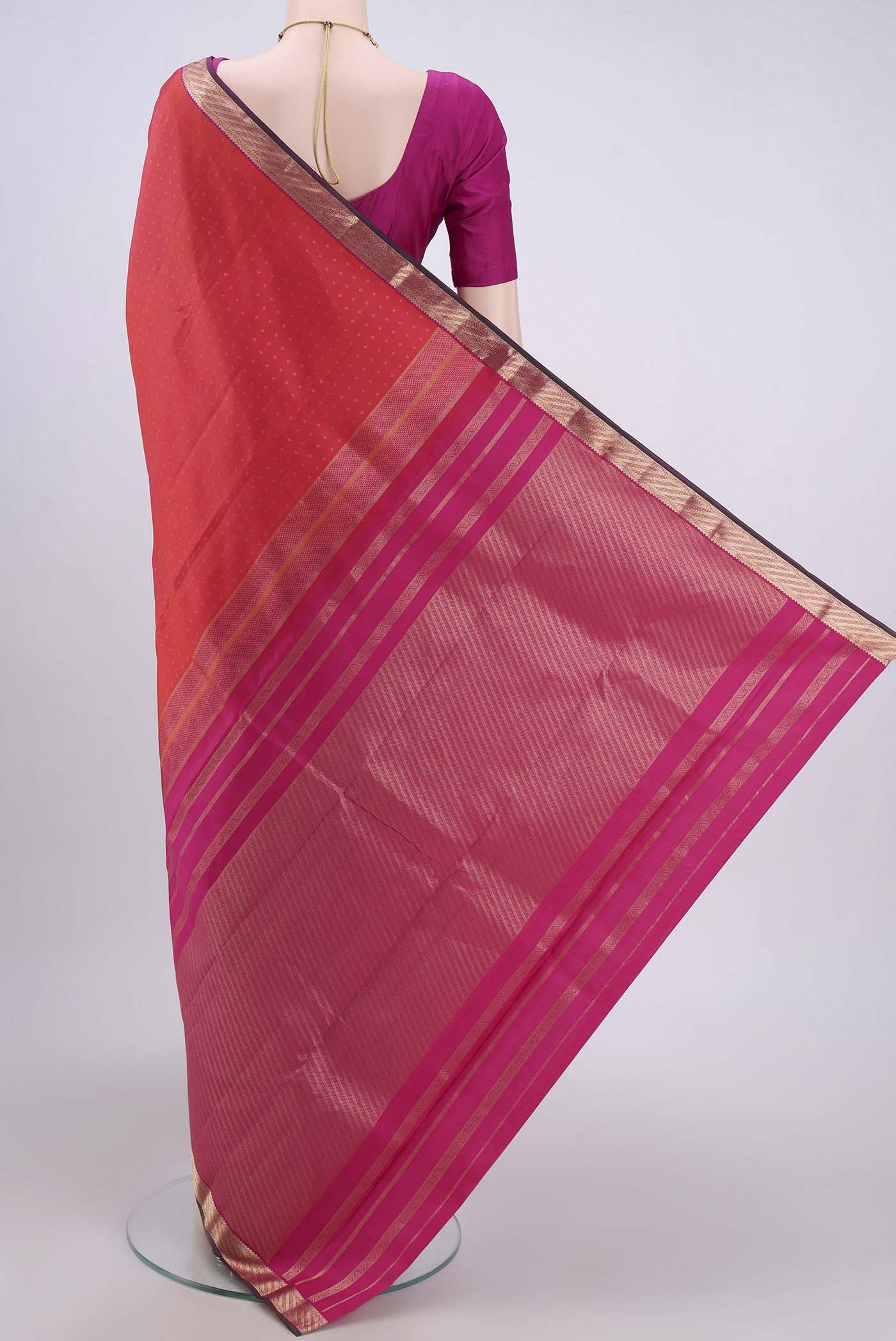 Flat view of Rust Dual Tone Nangavalli Silk [ Salem ] Saree with Zari Butta on the body and Zari Border. 