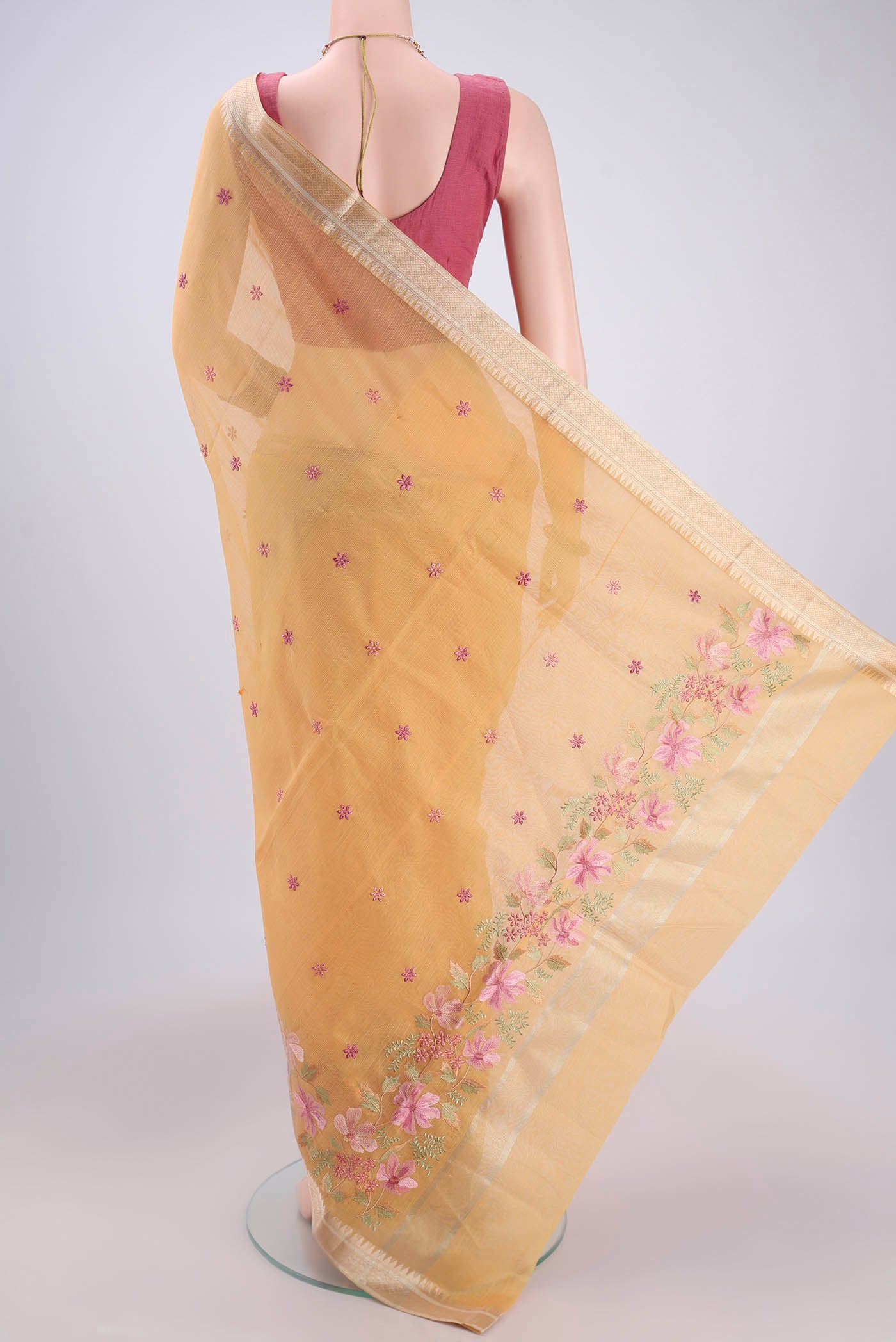 Flat view of Yellow Kota Silk Saree with Embroidery on the body and Plain Border. 