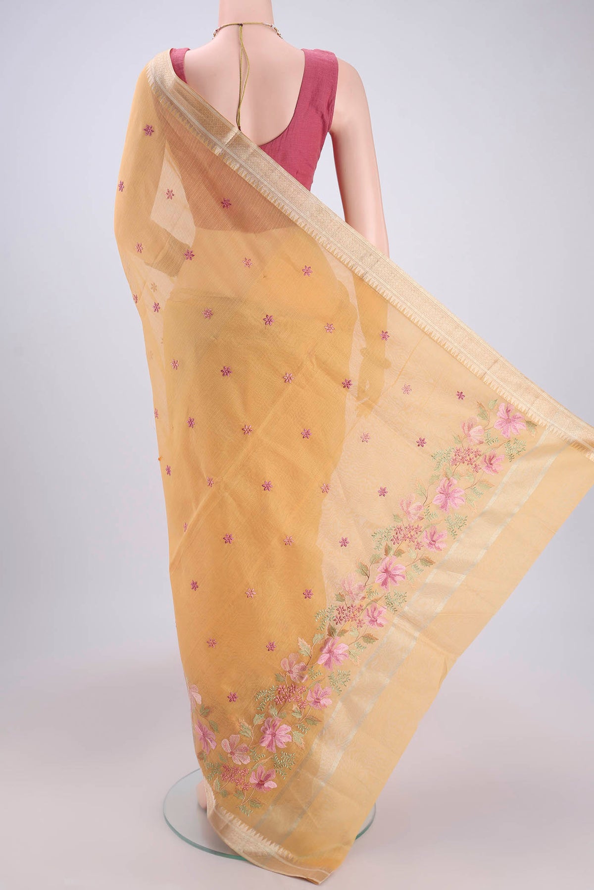 Flat view of Yellow Kota Silk Saree with Embroidery on the body and Plain Border. 