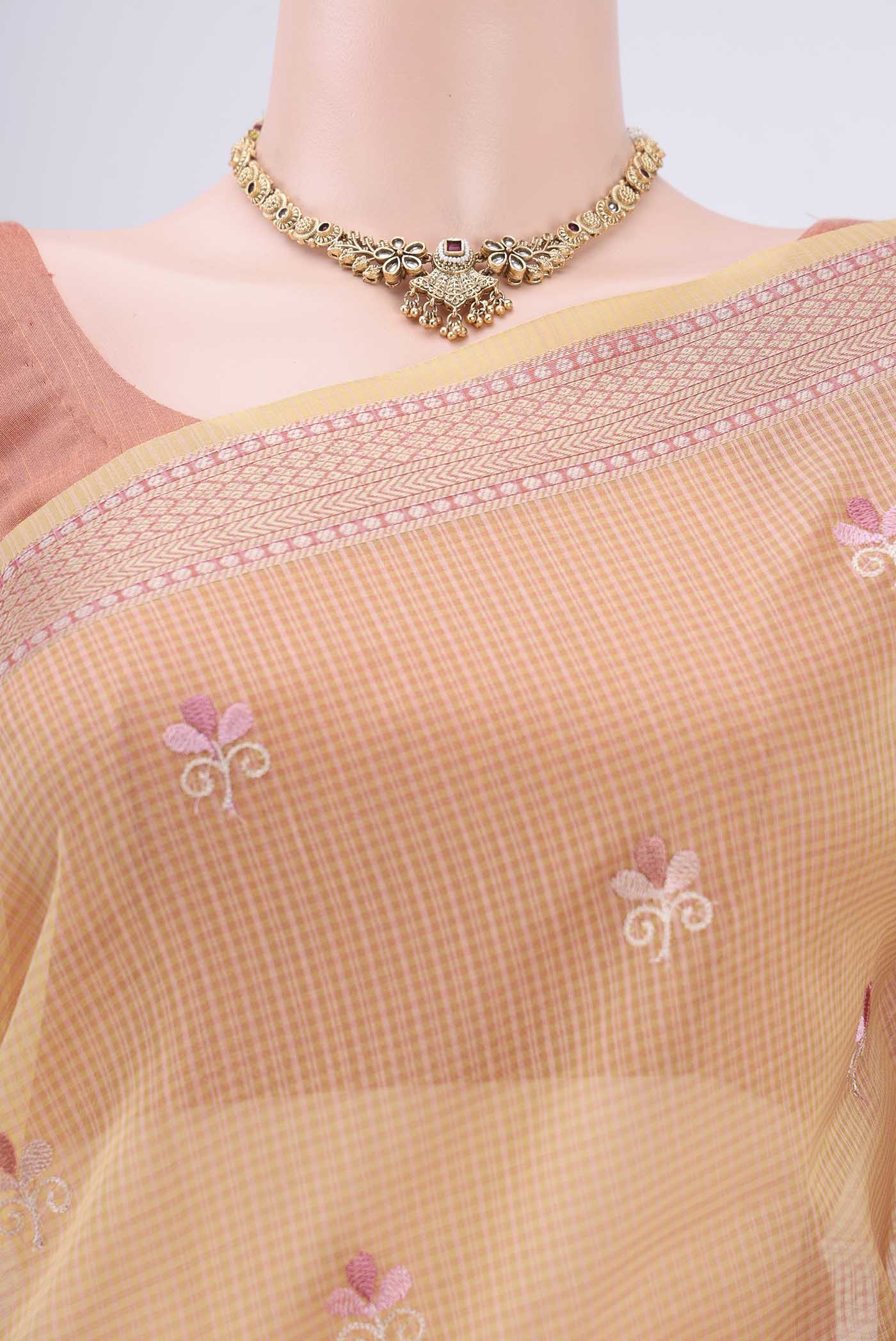 Border image of Yellow Coimbatore Silk Cotton Saree with Embroidery on the body and Plain Border. 