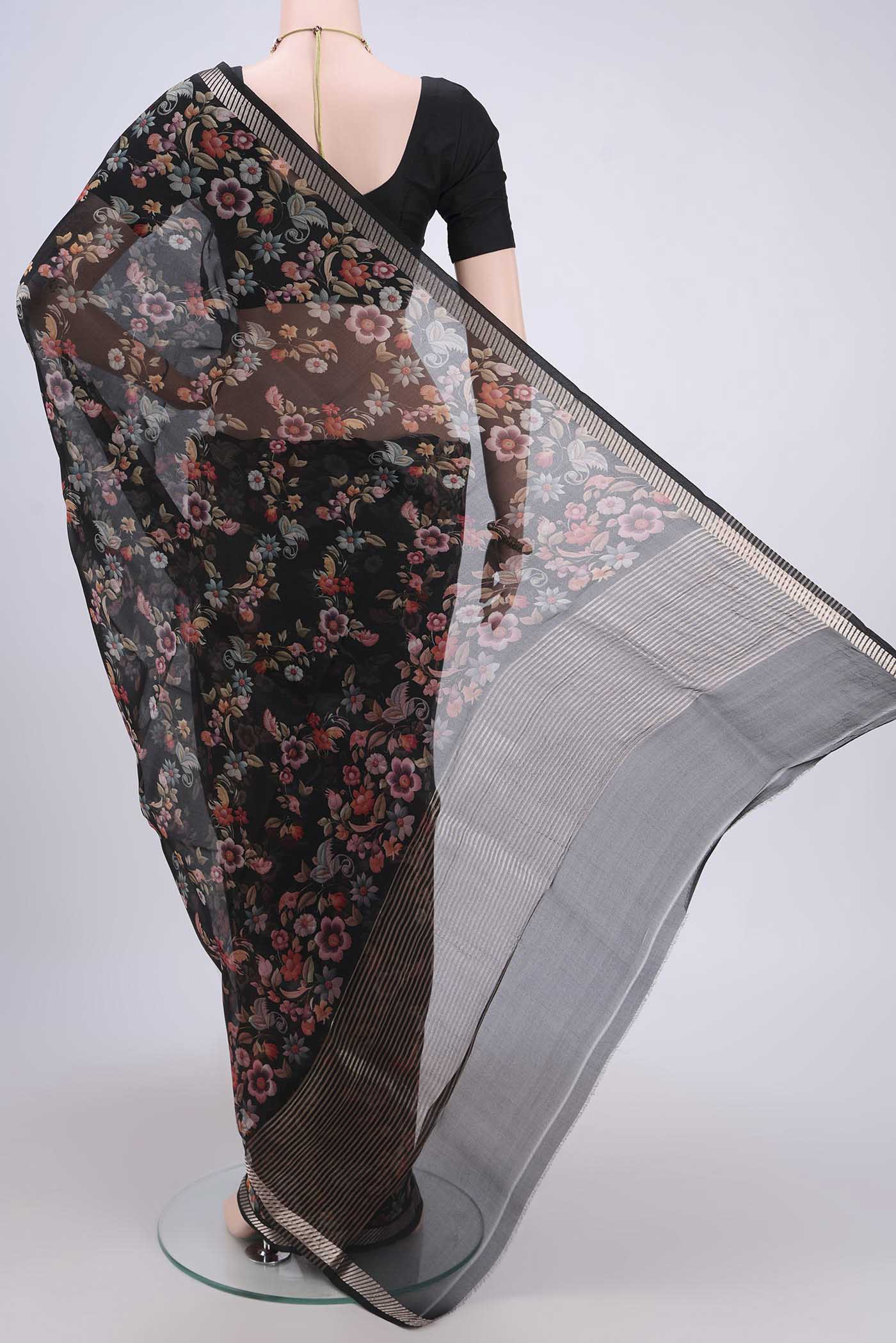 Flat view of Light Green Organza Silk Saree with Floral Print on the body and Zari Border. 