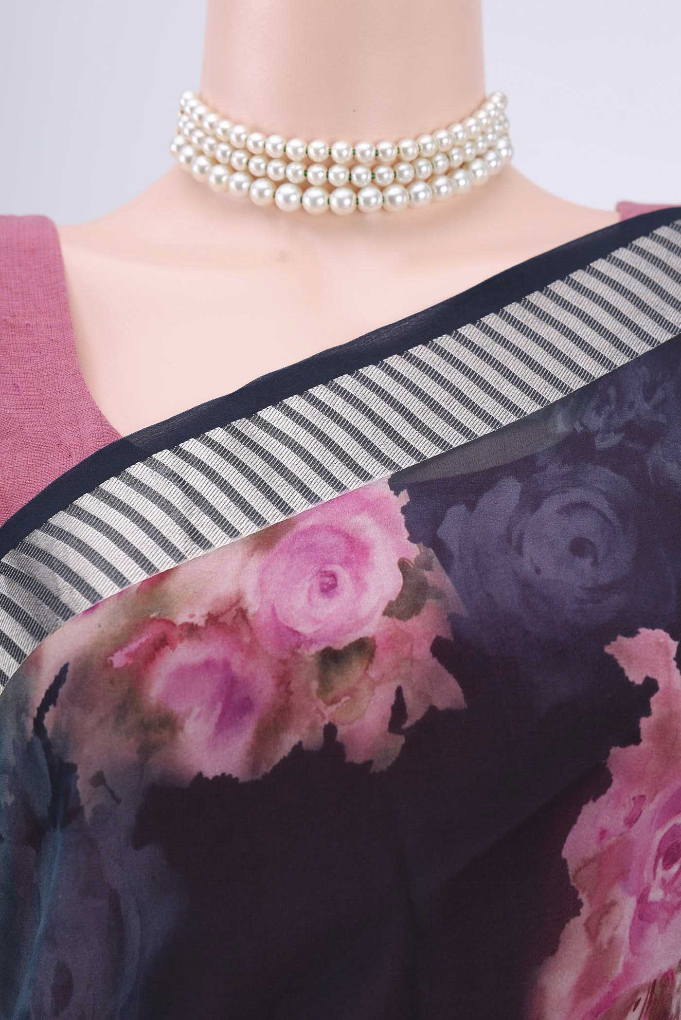 Border image of Navy Blue Organza Silk Saree with Floral Print on the body and Zari Border. 