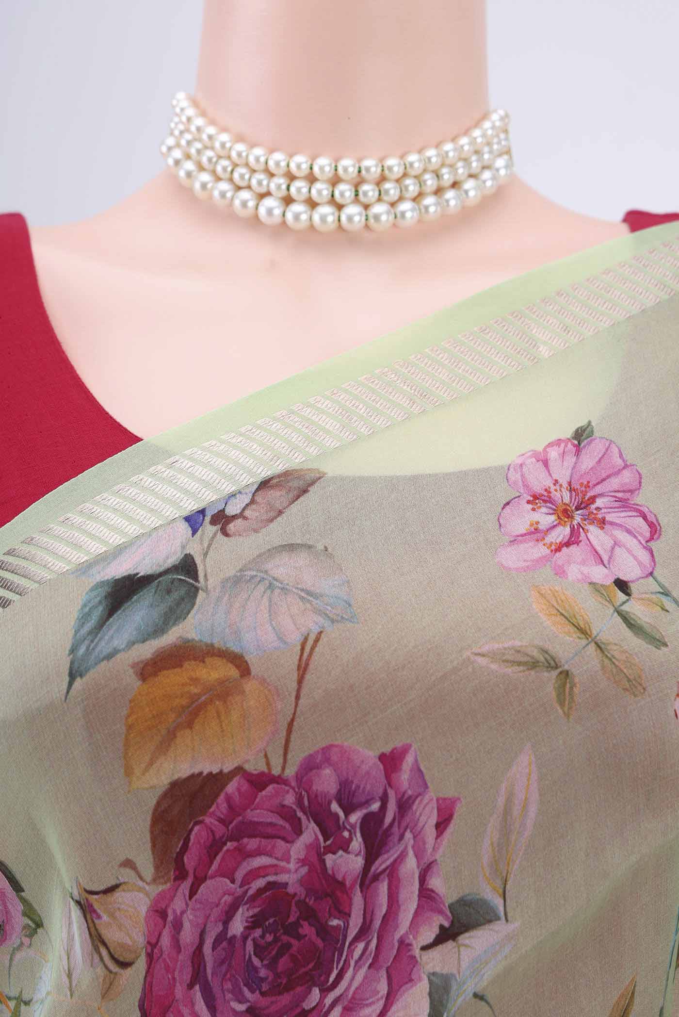 Border image of Light Green Organza Silk Saree with Floral Print on the body and Zari Border. 