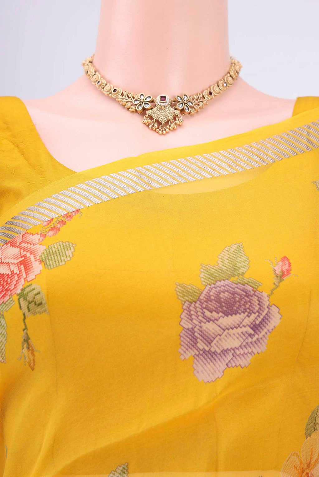 Border image of Yellow Organza Silk Saree with Lehariya on the body and Zari Border. 