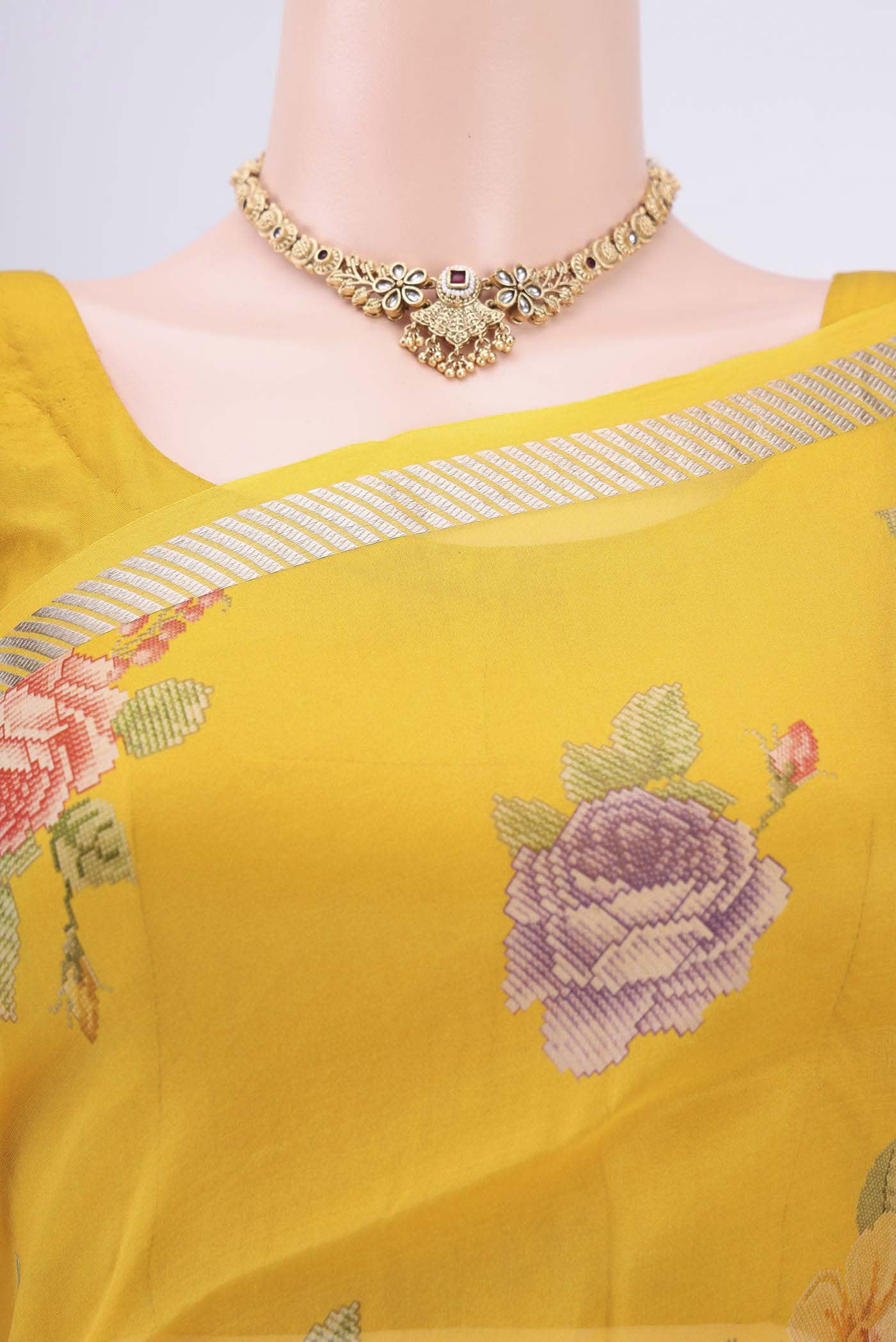 Border image of Yellow Organza Silk Saree with Lehariya on the body and Zari Border. 