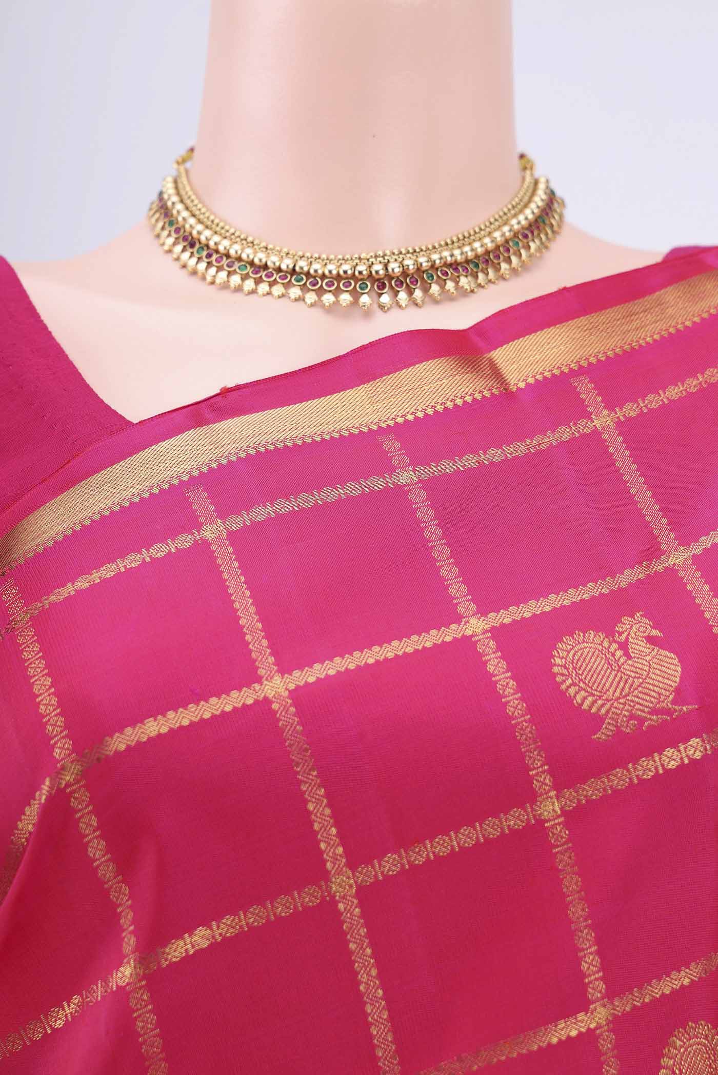 Border image of Pure Silk Pure Zari Dark Pink Dual Tone Kanjivaram Saree with Checked design on the body and Zari Border. 