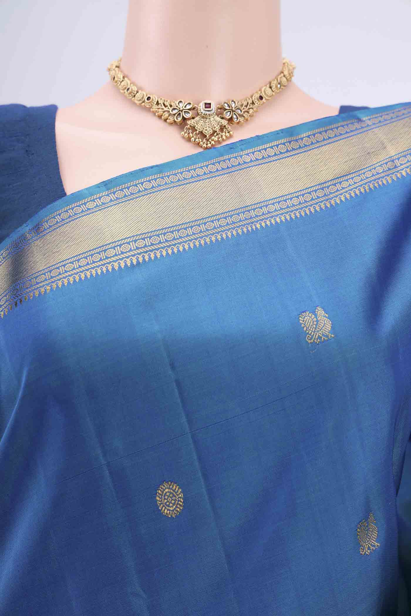 Border image of Blue Dual Tone Kanjivaram Silk Saree with Zari Butta on the body and Zari Border. 
