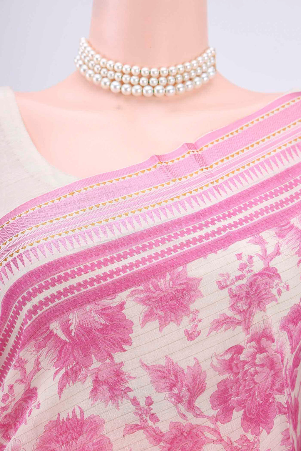 Border image of Cream Tussar Saree with Floral Print on the body and Thread Border. 