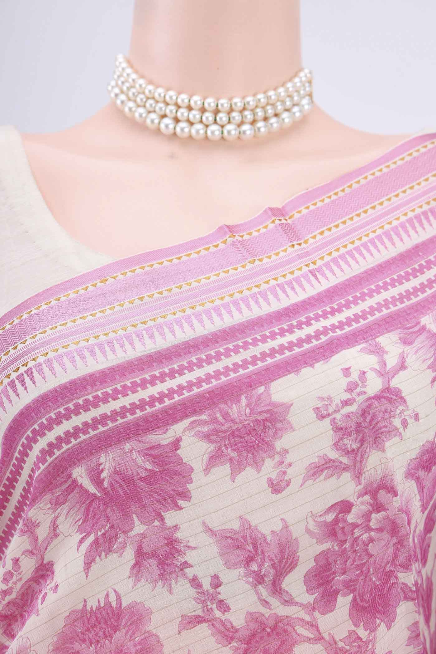 Border image of Cream Tussar Saree with Floral Print on the body and Thread Border. 
