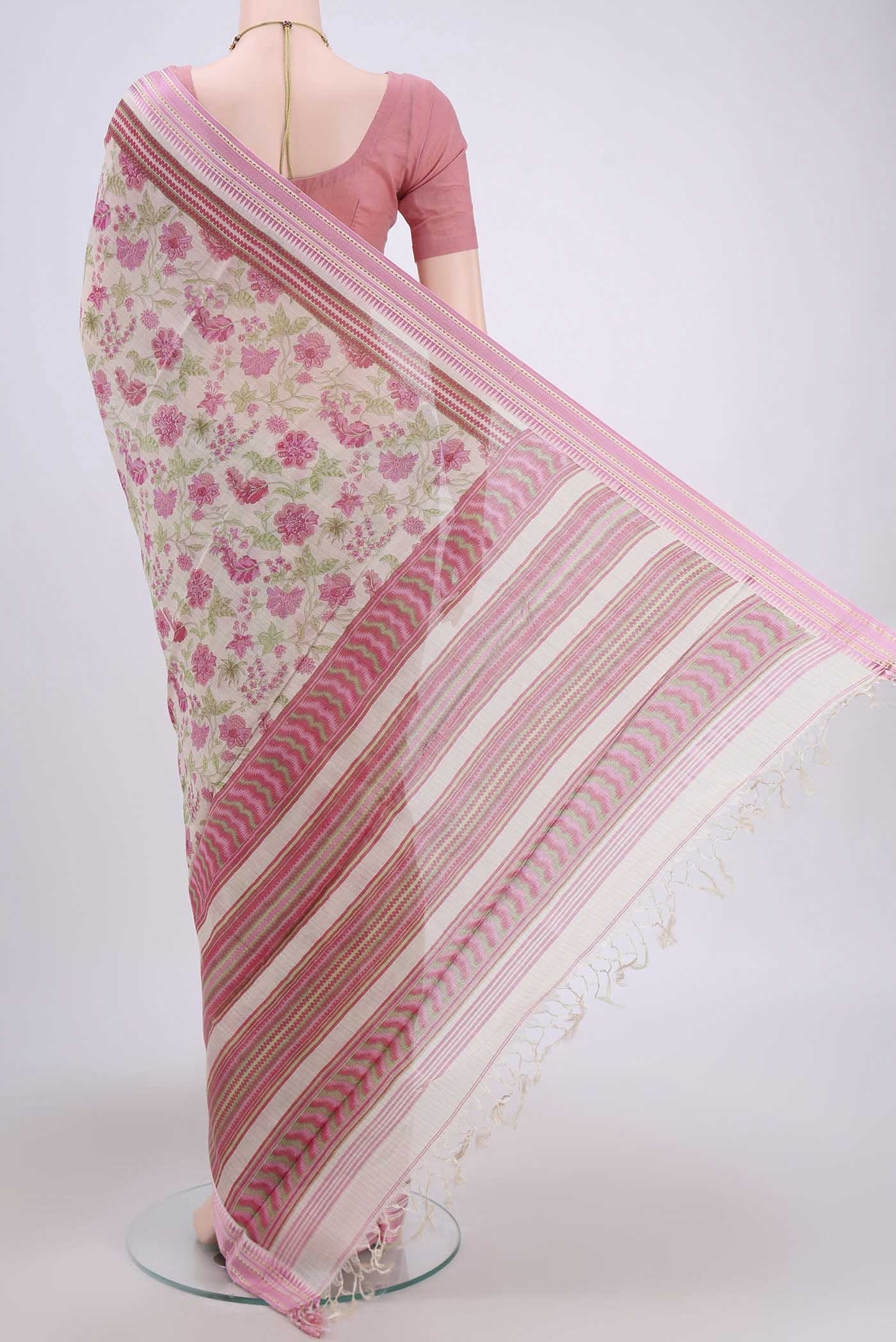 Flat view of Beige Tussar Saree with Floral Print on the body and Thread Border. 