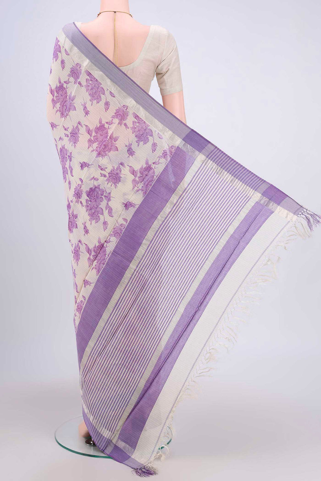 Flat view of Off White Tussar Saree with Floral Print on the body and Plain Border. 