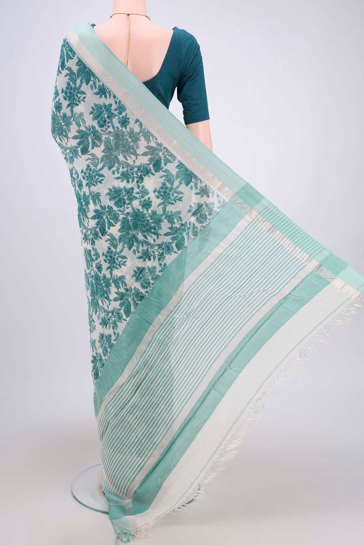 Flat view of Beige Tussar Saree with Floral Print on the body and Thread Border. 